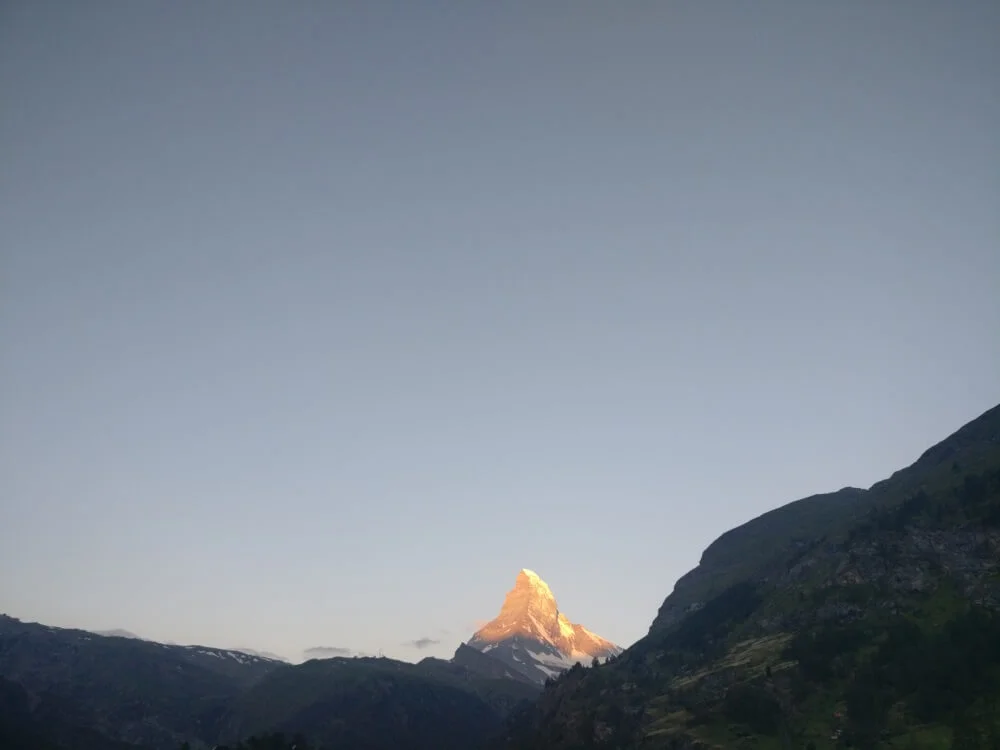 After celebrating your arrival into Zermatt and completion of the Walker’s Haute Route, make sure to set your alarm for sunrise to witness the Alpenglow of the Matterhorn. It may be the last thing you want to do in the morning but a special moment that will stay with you forever.