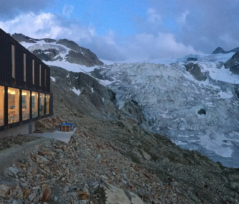 Cabane de Moiry has a dining room with a glass facade that allows guests to enjoy views of Glacier de Moiry throughout their stay