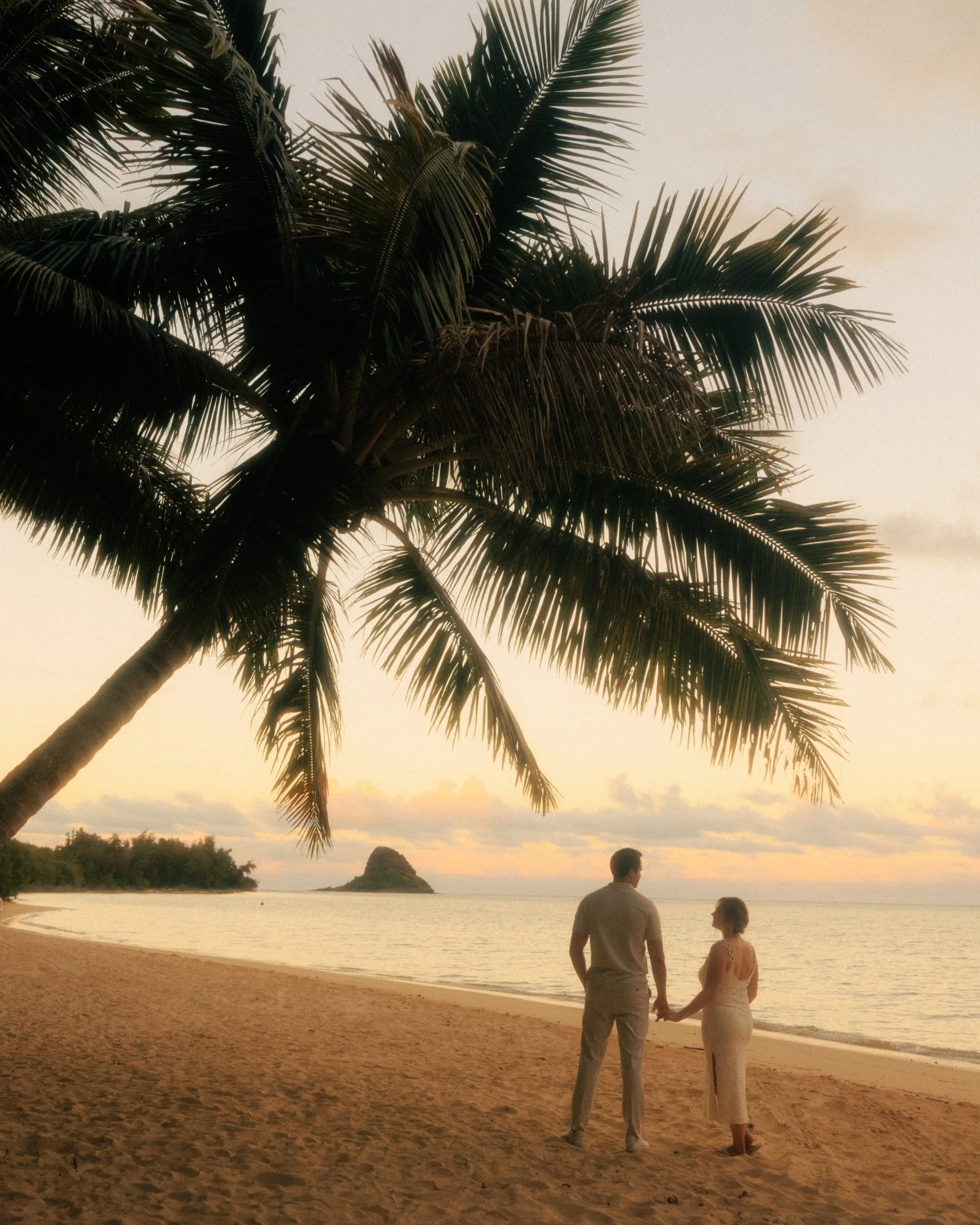 Sasha &amp; Francisco's Golden Hour Engagement Session at Kualoa Ranch Secret Island &amp; Kualoa Regional Park