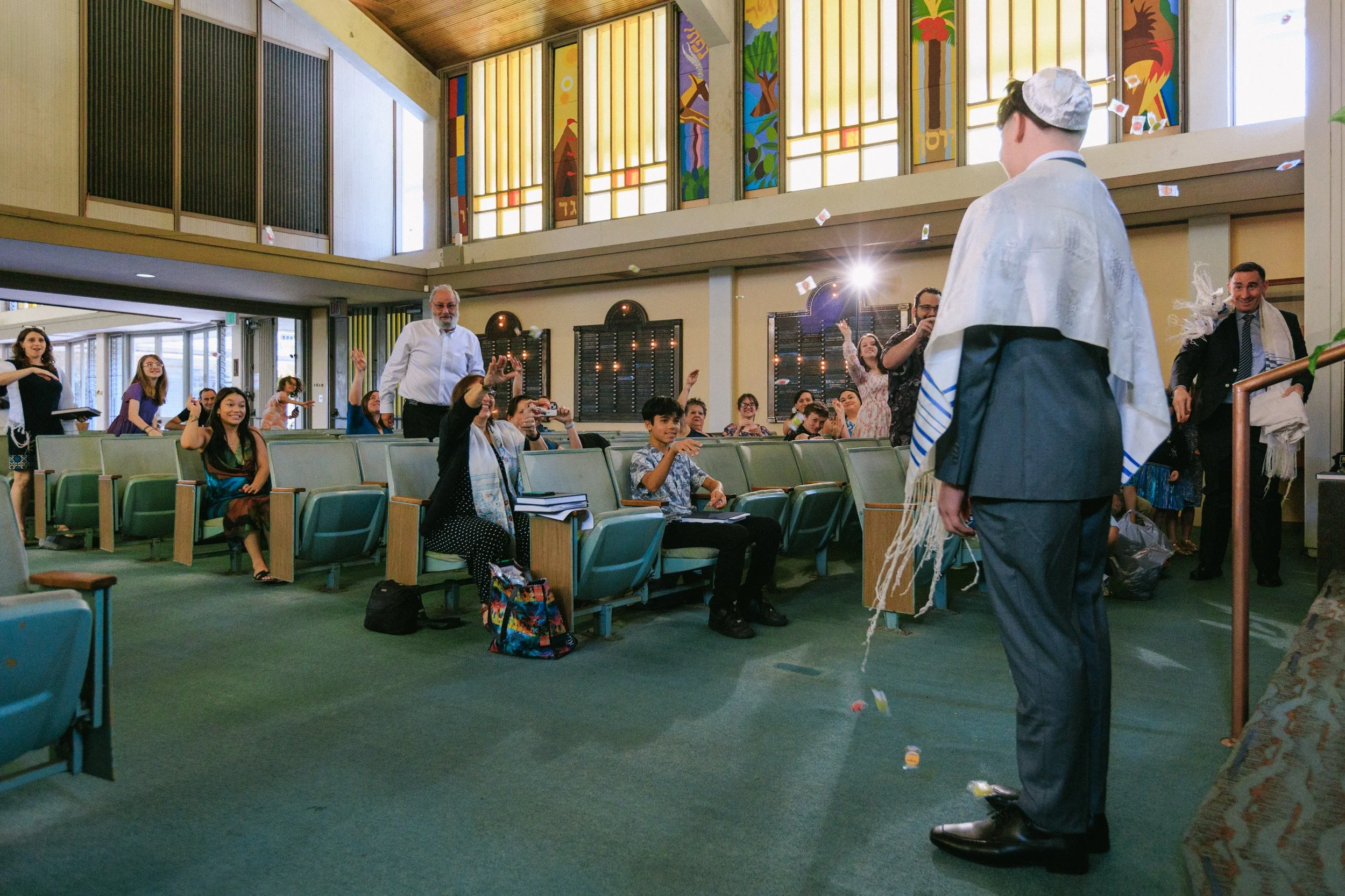 candy toss celebration after bar mitzvah ceremony Temple Emanu-El Honolulu