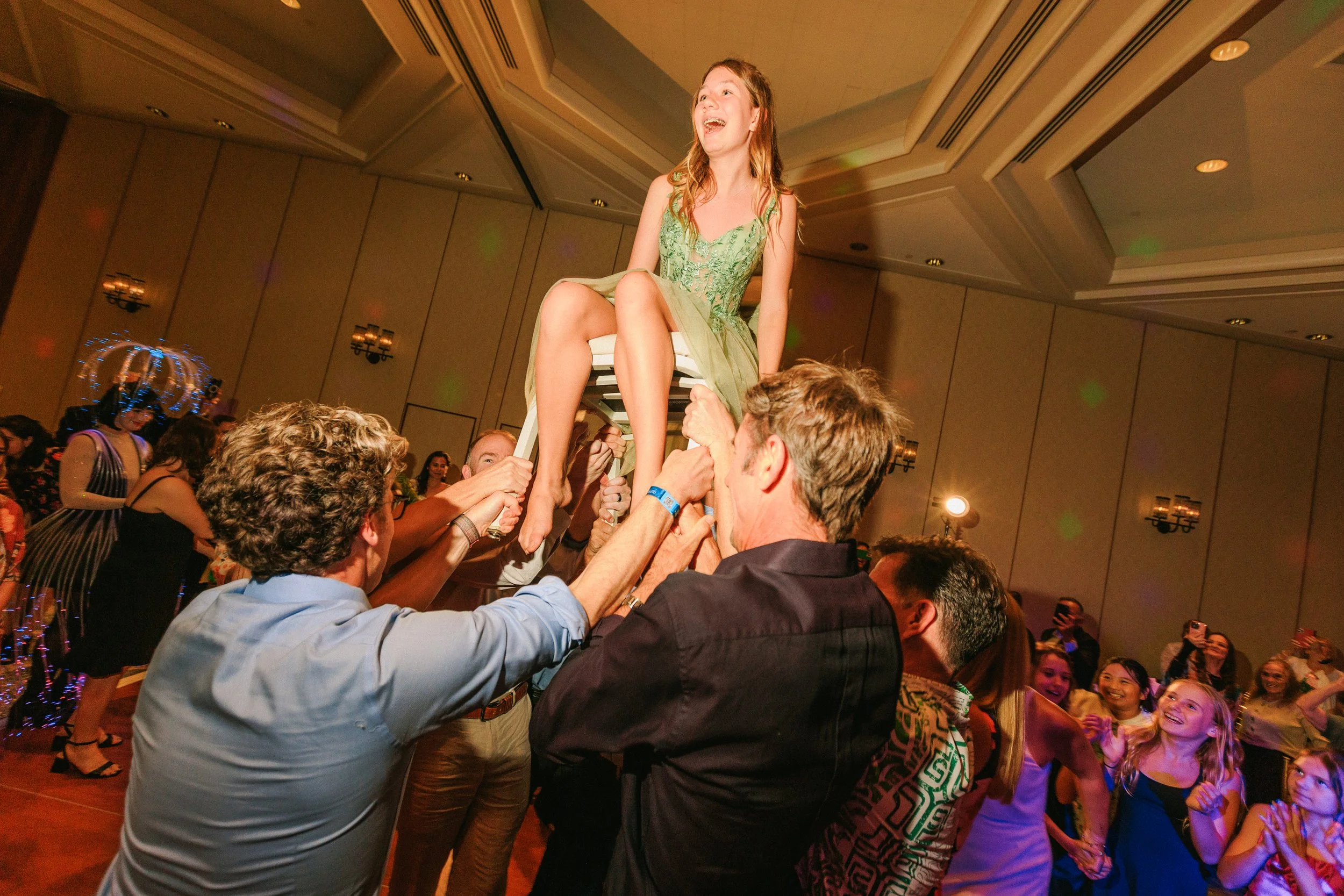 Bat mitzvah chair lift celebration at Halekulani Waikiki during the reception