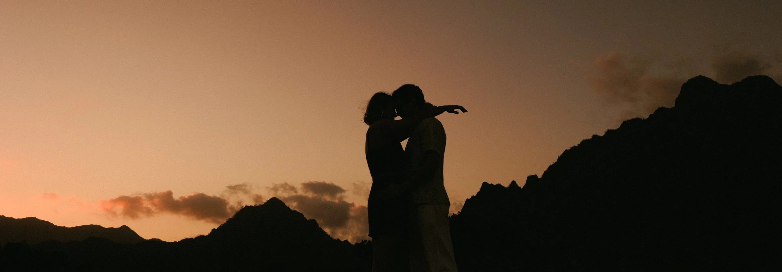Sunset engagement photos at Kualoa Regional Park taken by an Oahu proposal photographer
