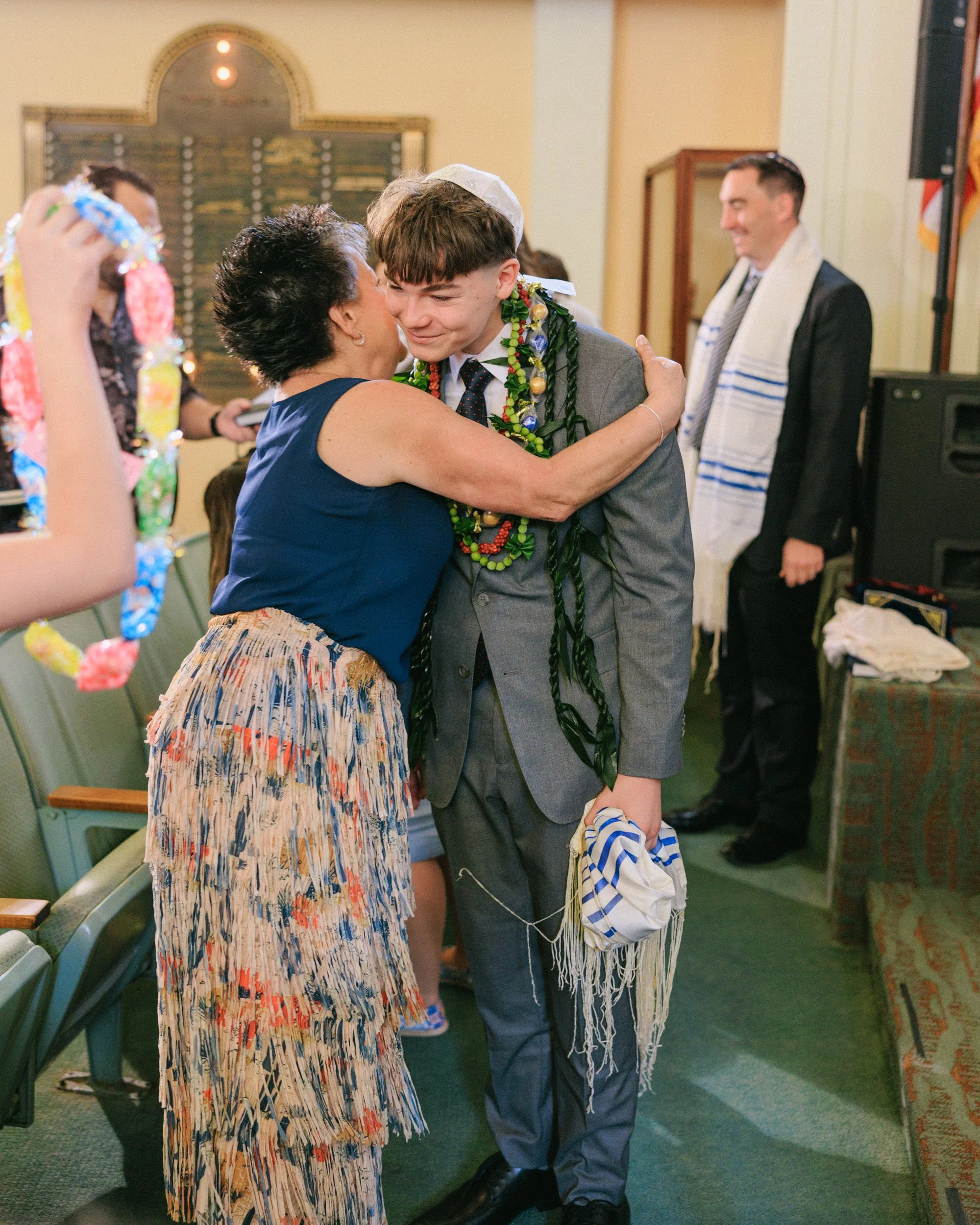 natural moment between family and Kevin after ceremony Hawaii