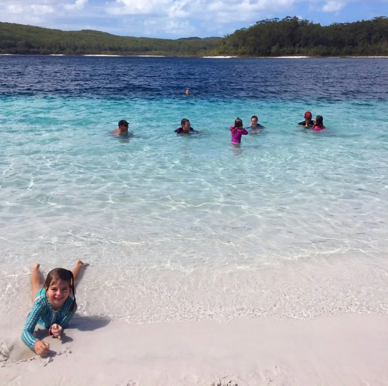 Swimming in the pristine waters of Lake McKenzie. A true gem.