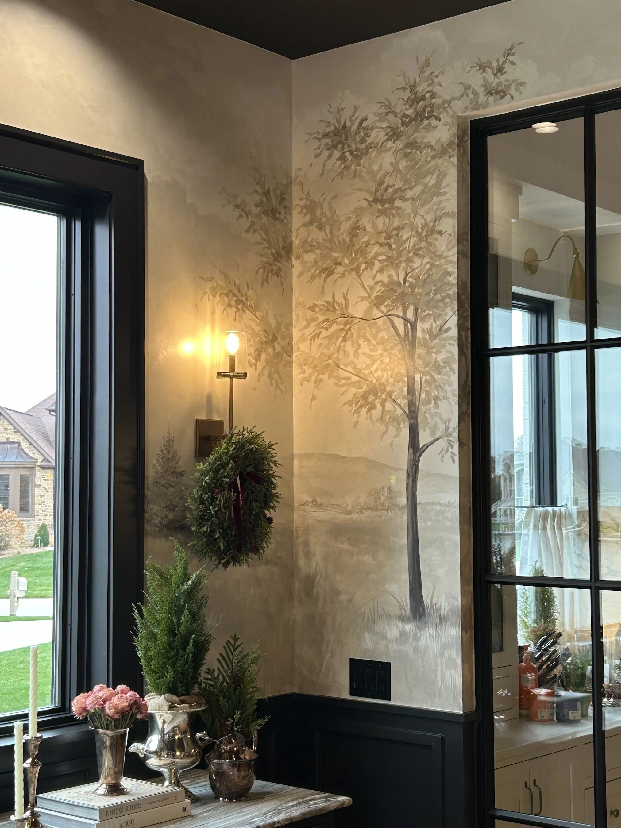 A monochromatic mural painted on the walls is better than a printed wallpaper mural, no seams and no repeated patter, it is also one of a kind. 
