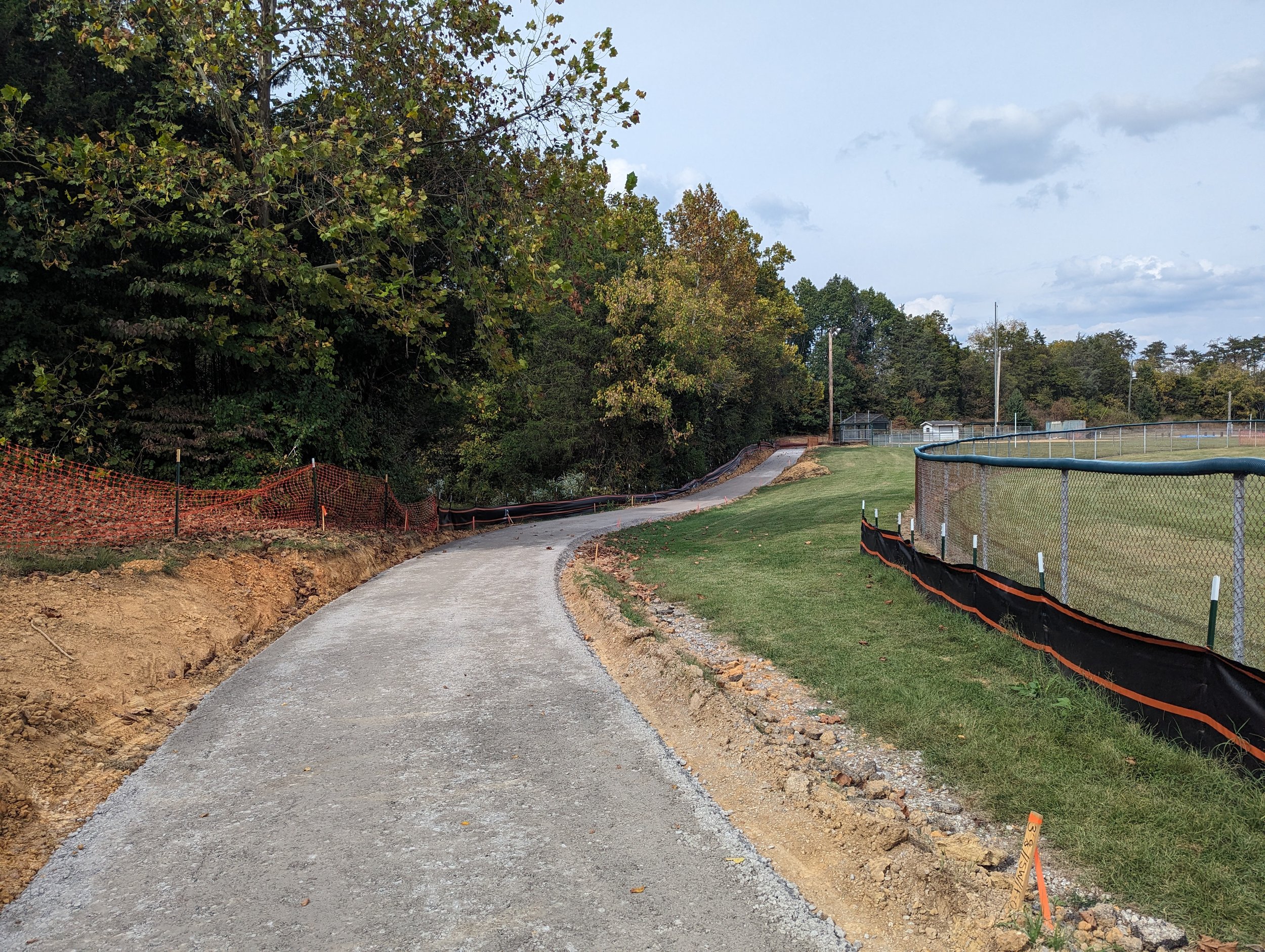 10/5/2023 - Base stone for the regraded walking trail is in place ready for asphalt placement to begin.