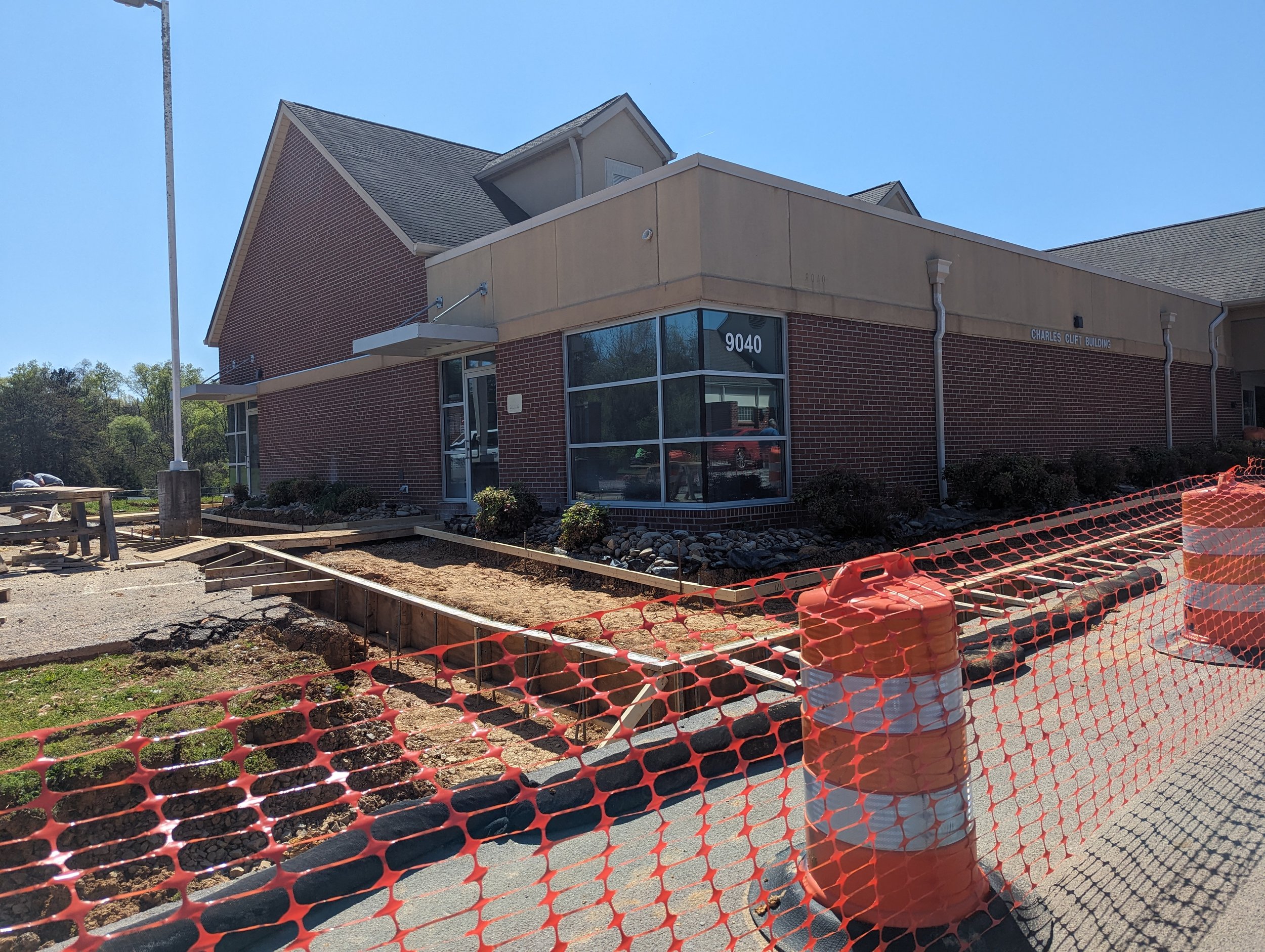 4/12/2024 - Crews build forms for the new ADA-compliant sidewalks along the side and back of the Carter Senior Center.