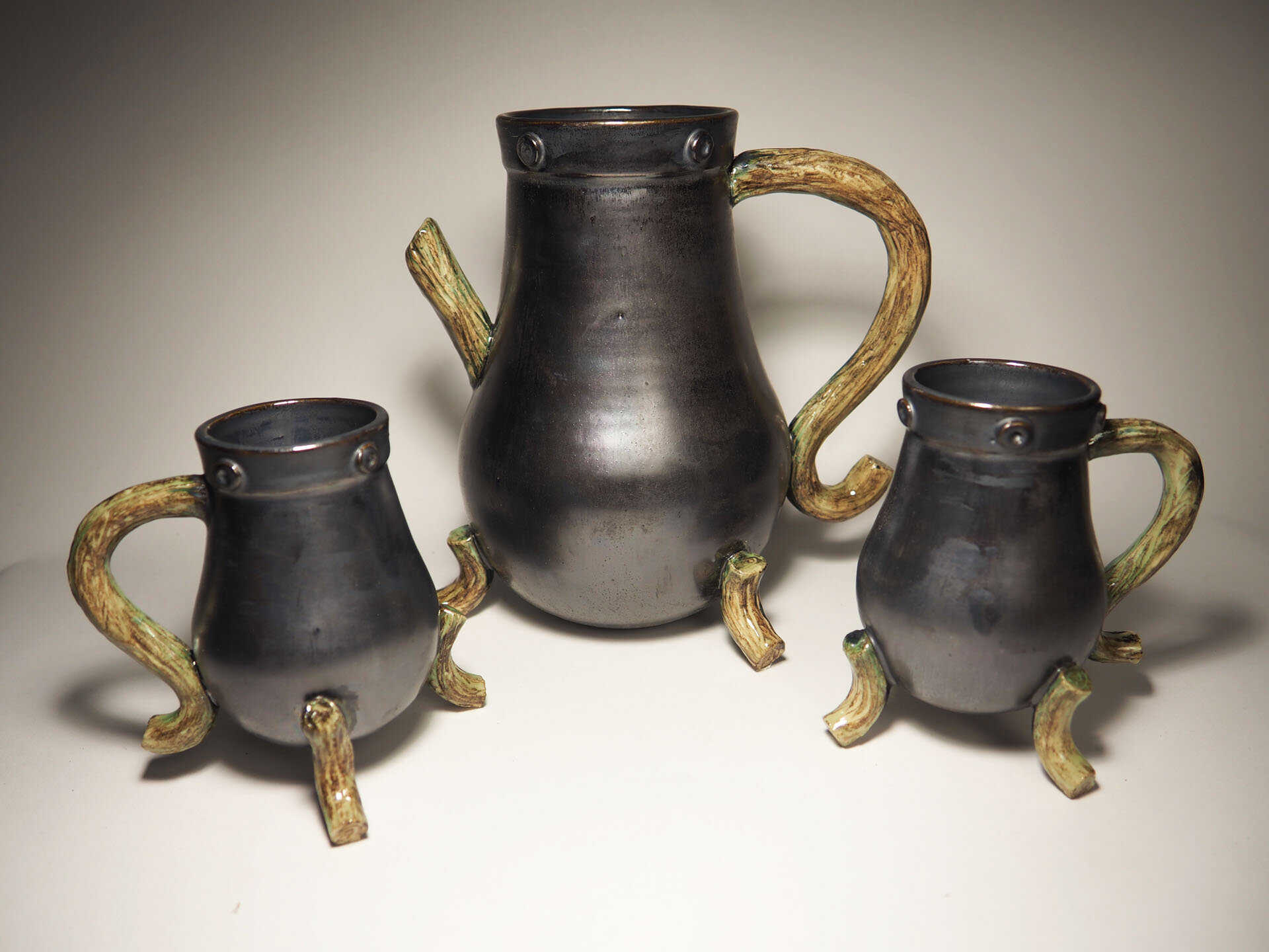 Metalled wood feet teapot set.jpg