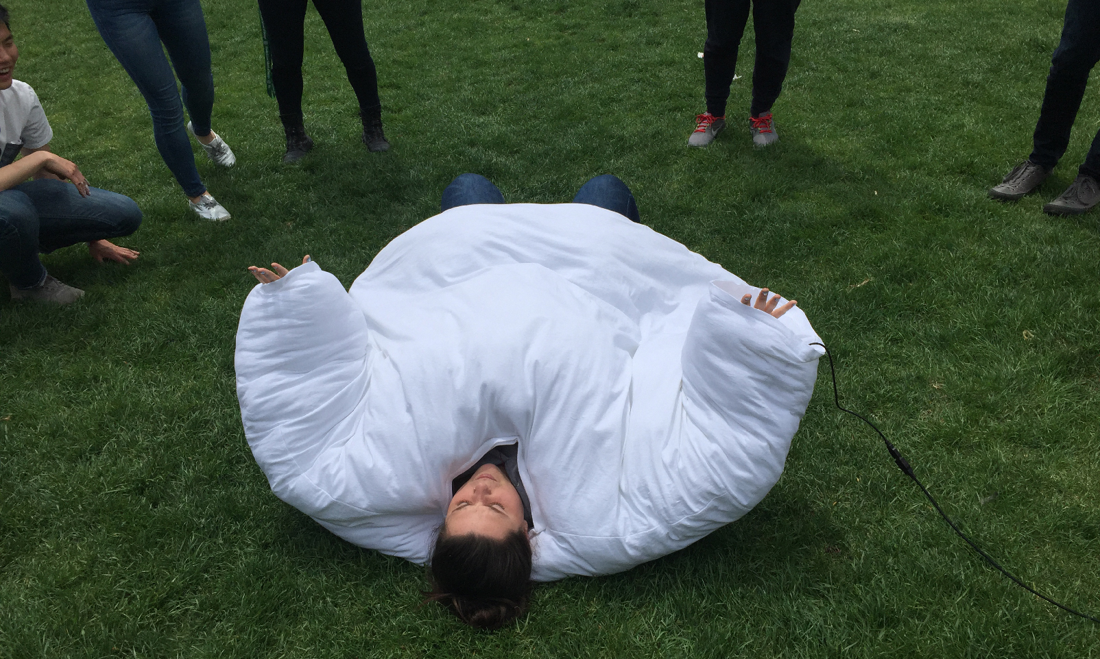 Sound-Spot | “Sound-Spot |” is a big musical T-shirt which set on the lawn just like a cozy mat. It is free for everyone to sit or lie on it. Their action will trigger a sound tone, which will be played out by a big speaker at the same time. Invi