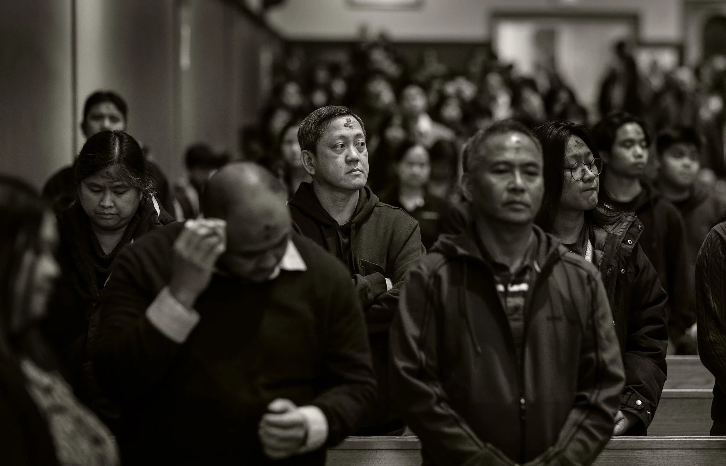 Catholic faithful take part in Ash Wednesday service at Winnipeg Filipino Catholic church