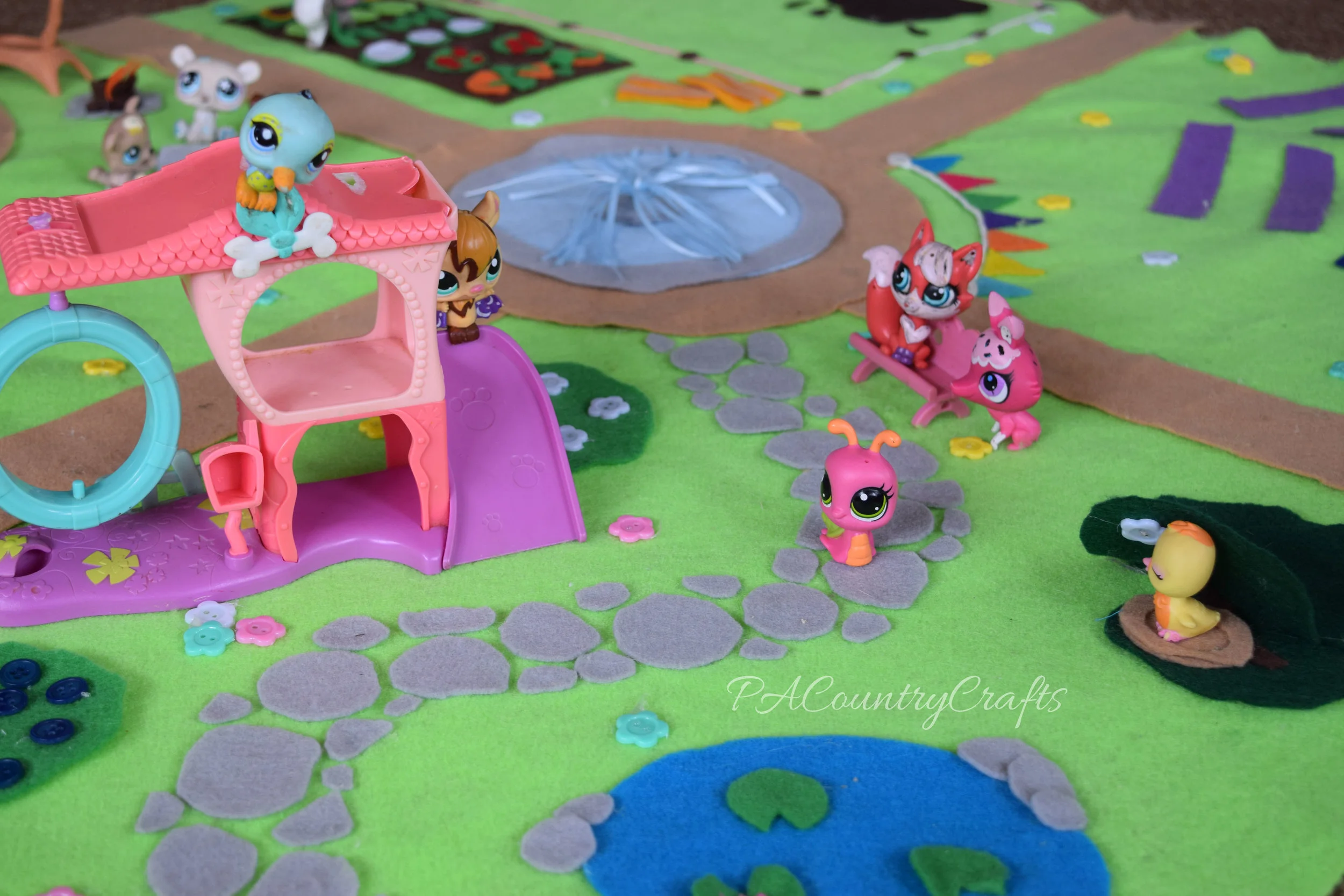 Littlest Pet Shop toys on a DIY felt play mat