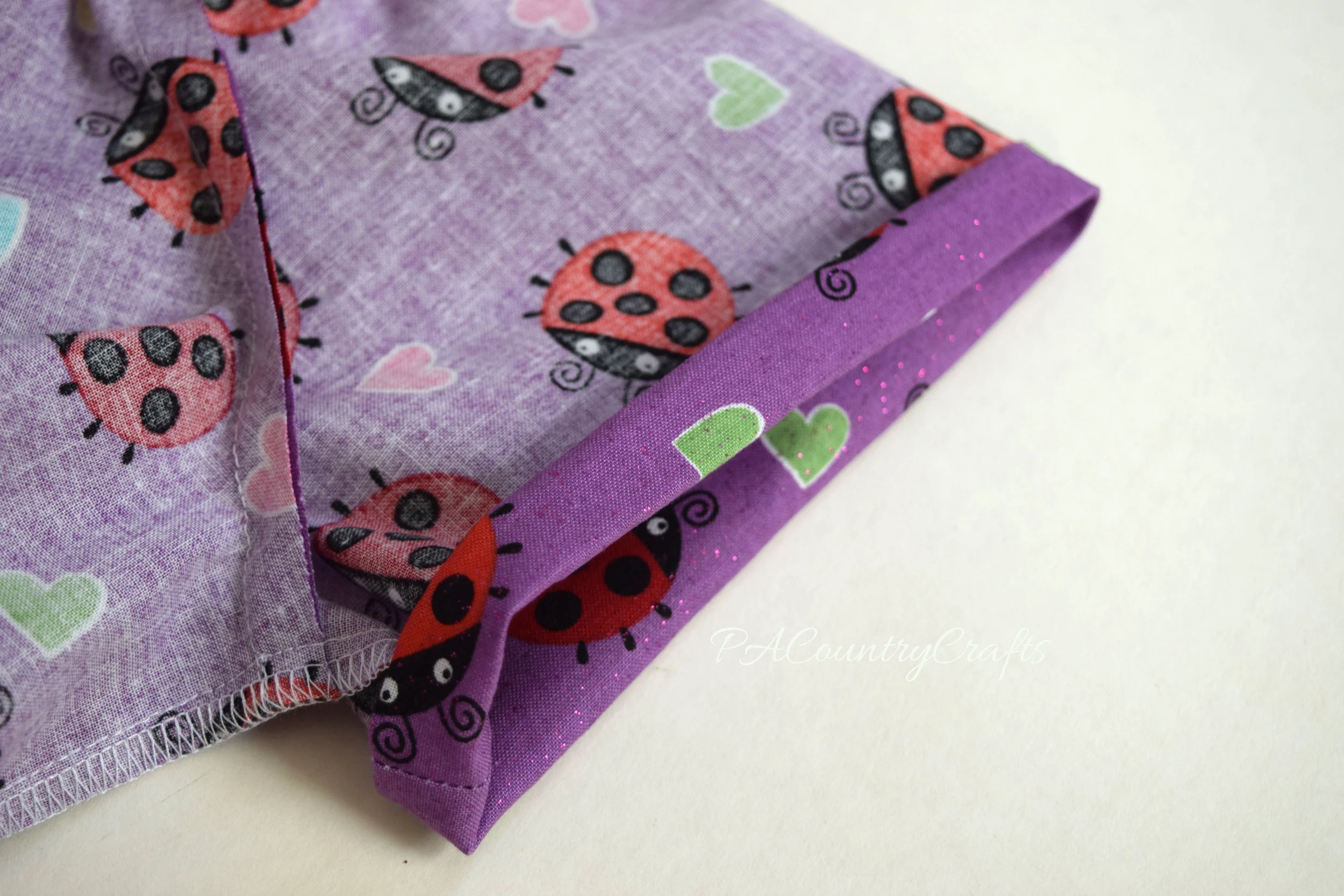 Fold under to sew casings for elastic on sleeves