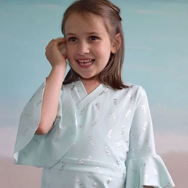 She is pretending to talk on her "shell phone"! 🤣 I made this @projectrunandplay Coral Wrap Dress/Top/Skirt in maxi length with bell sleeves. She loves it so much that she asked if she could wear it to bed last night. This is the last day to get this and the 9 other patterns in the #projectwatercolorbeach collection at the release sale price. 🧜‍♀️
#projectrunandplay #sewingpatterns #pacountrysews #pacountrycrafts