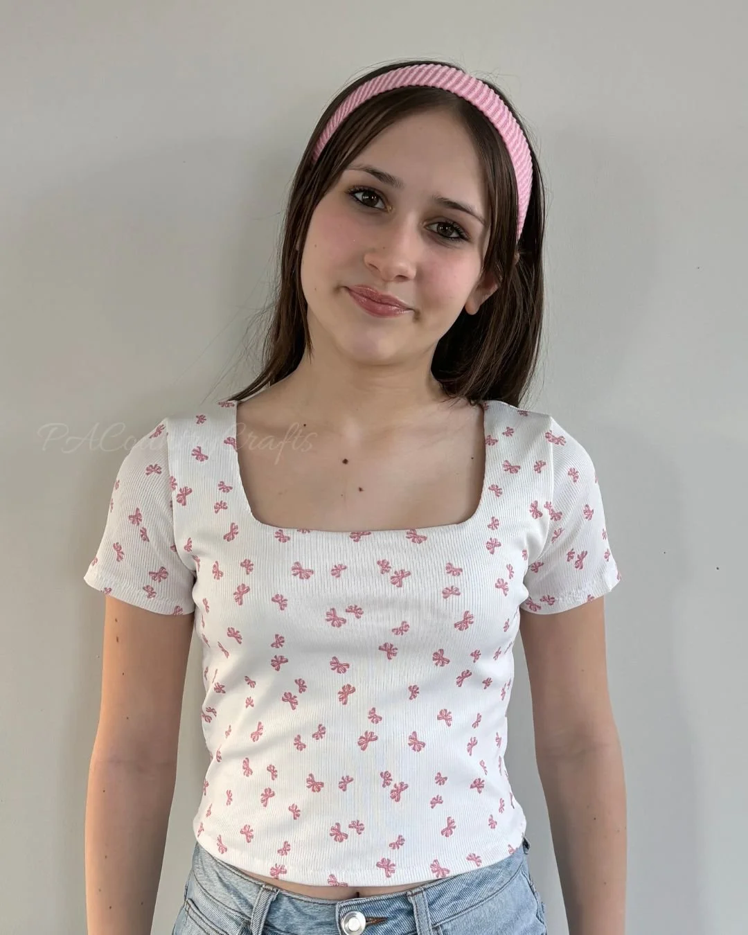 pink bows on ivory rib knit