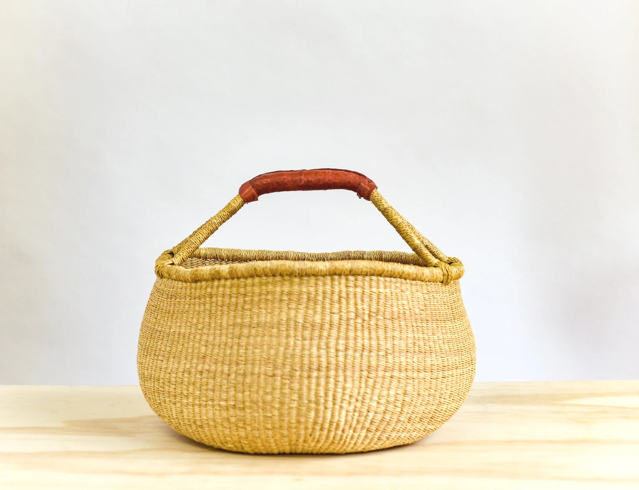 NOMADIC%2BCITIZEN_handwoven-round-market-bolga-basket_natural_06.jpg