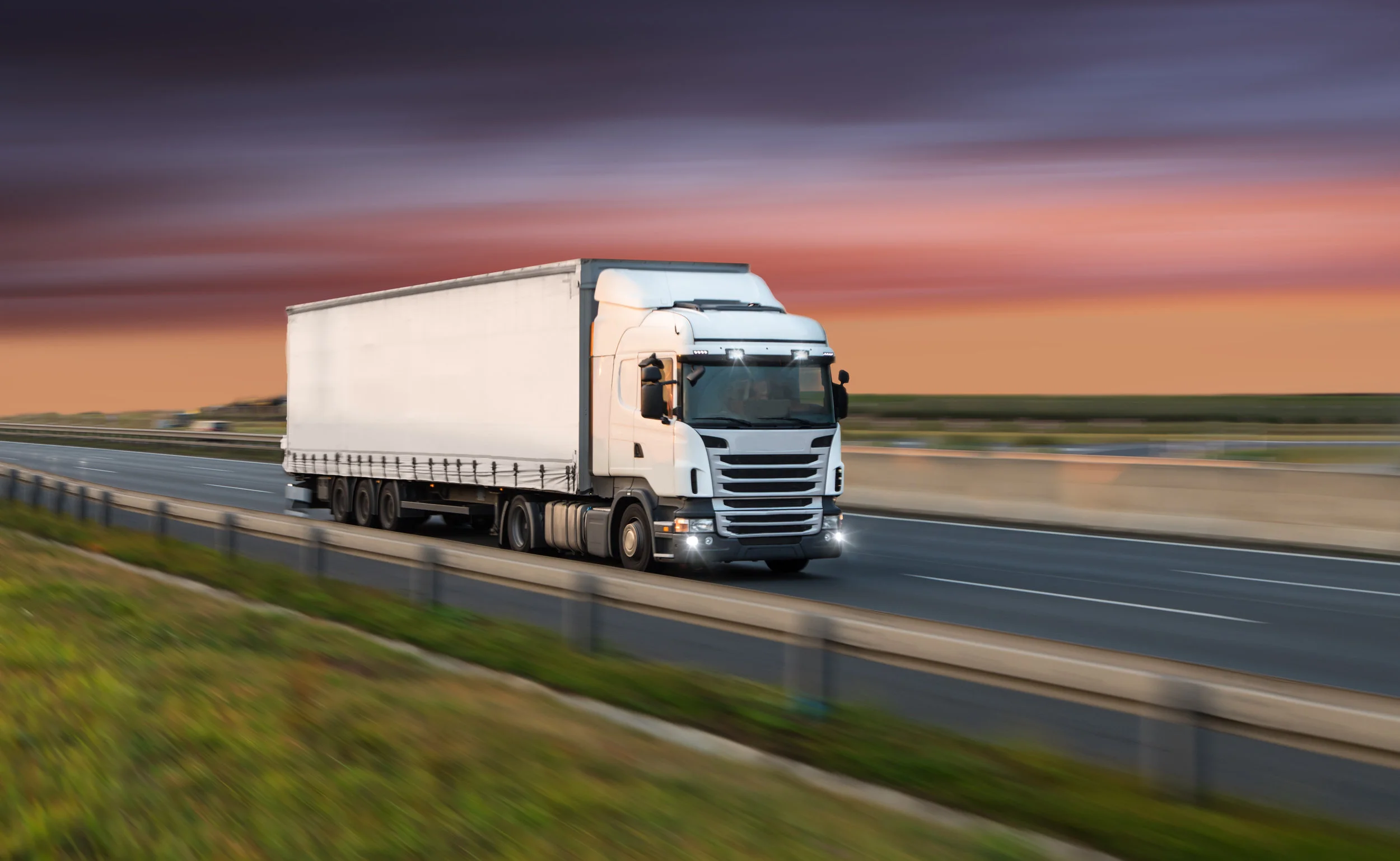 Canva - Truck with container on road, cargo transportation concept..jpg