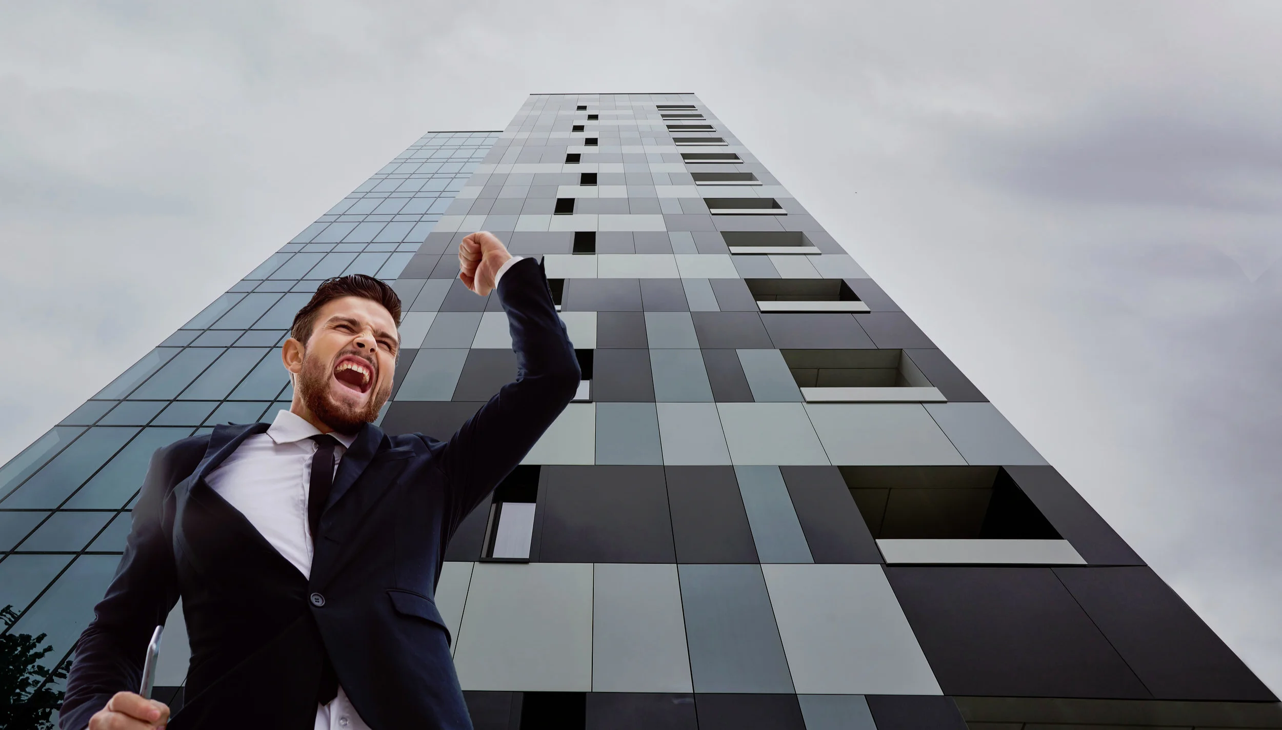 Canva+-+Businessman+Screaming+Raising+His+Hand+.jpg