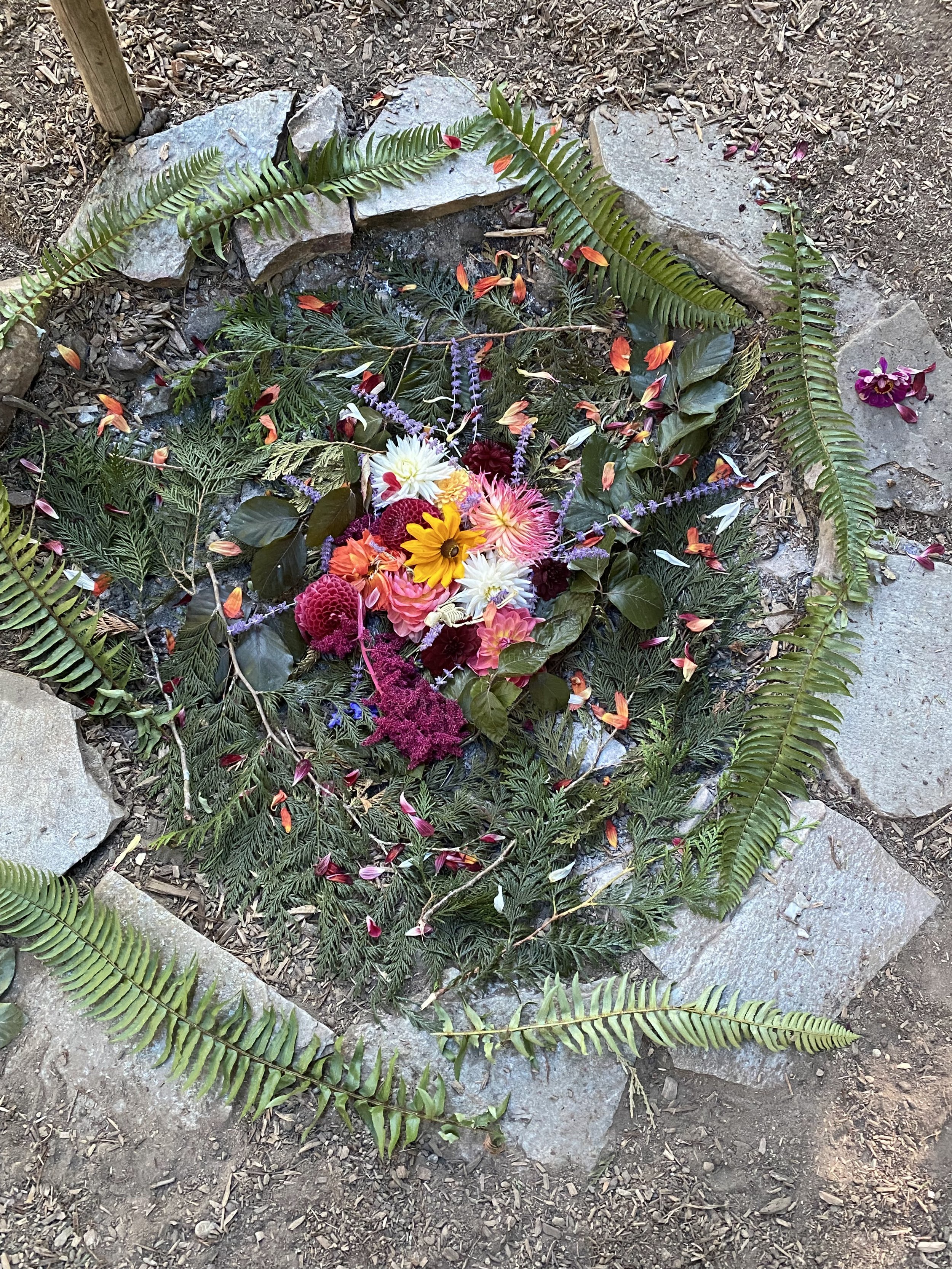 flowers in firepit altar.jpg