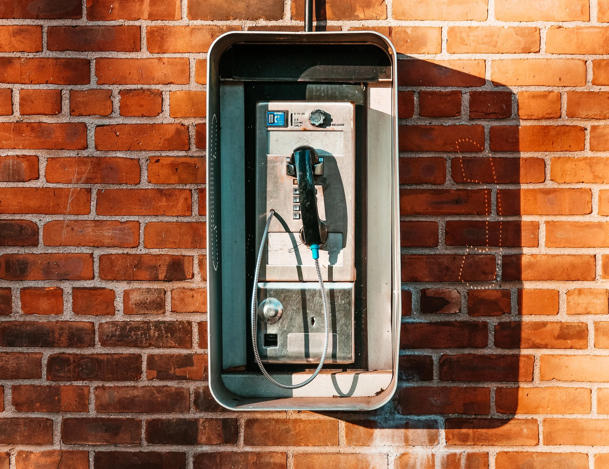 payphone-on-brick-wall_4460x4460.jpg