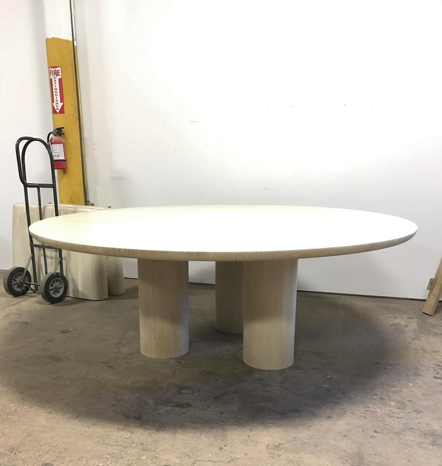 84&rdquo; round dining table in bleached white oak