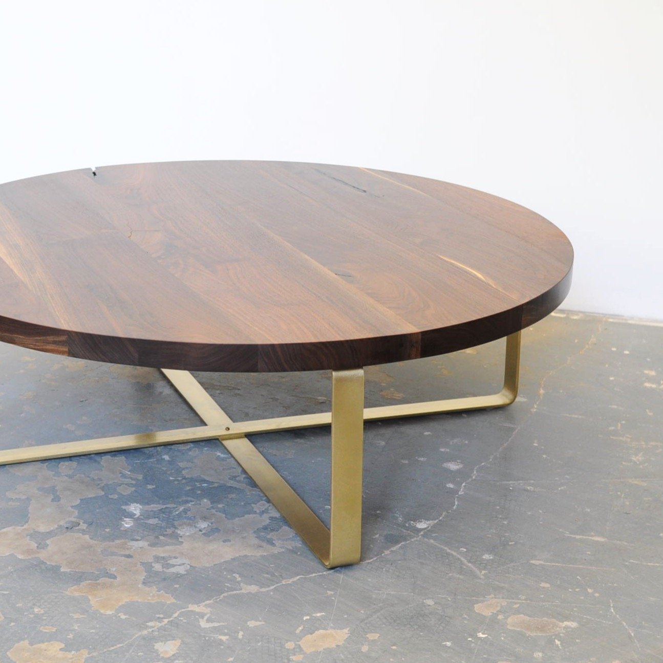 A Table a day....Day 2 Our Crescent coffee table in walnut with bent brass base. Walnut and brass seem a bit dated now days but still popular. This was a very early design (2015??) but very simple and I still love it. I can't count how many of these 