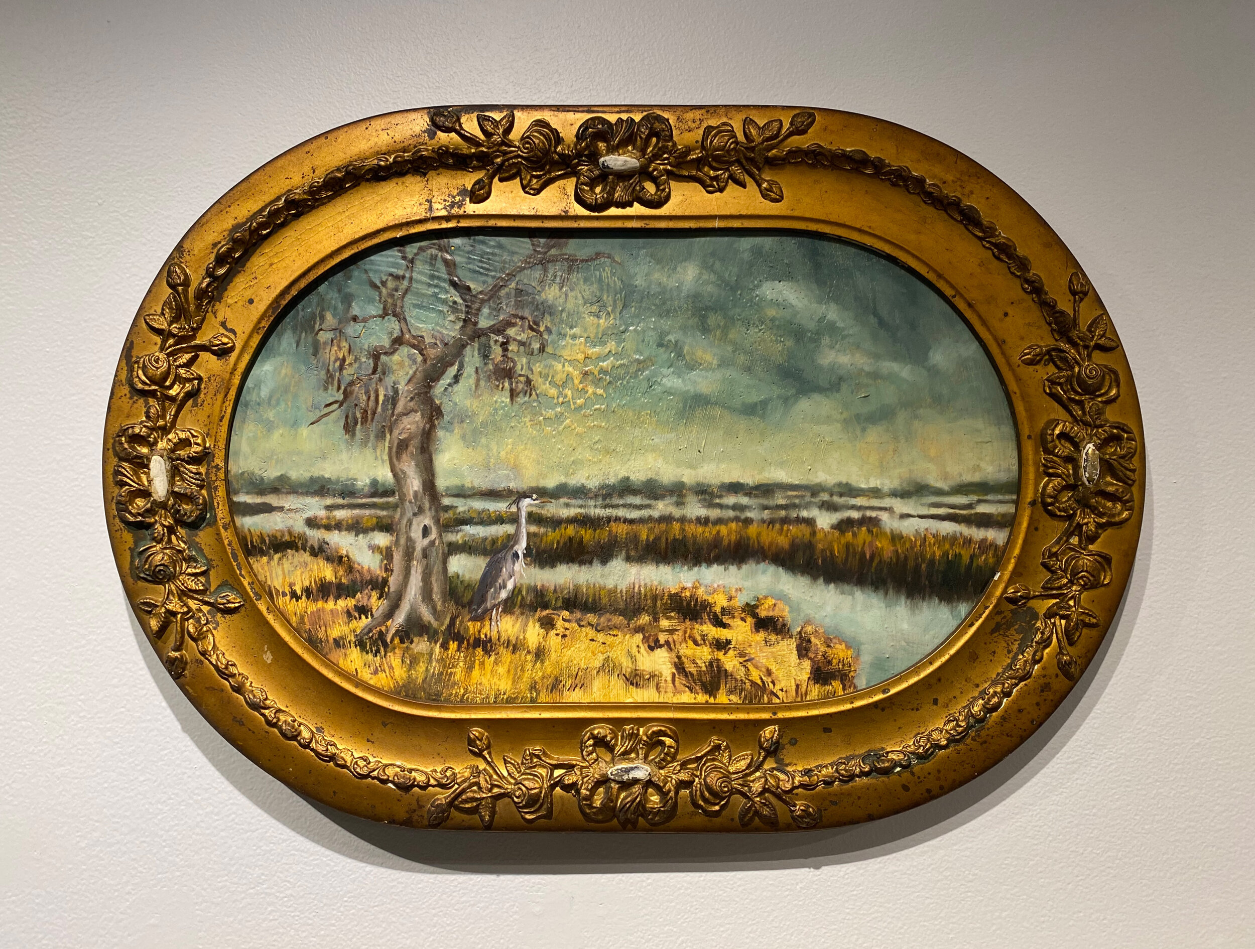 Wistful haint glancing over the water’s edge, unable to cross, longing for her love who was disappeared at sea ages ago, 2020. Oil on panel, 16” x 20” oval panel in a 17 .” x 25 .” antique found frame
