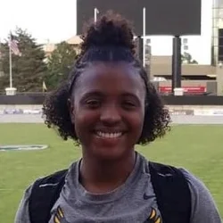 AKILAH “GOOSE” GUZMAN Community Programs Coach