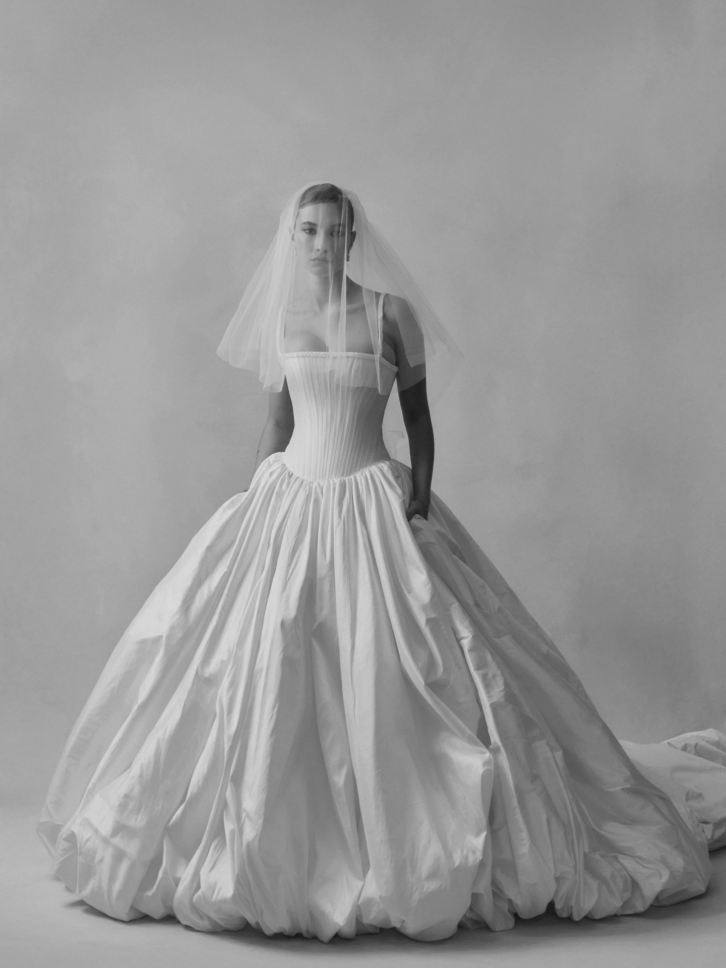 F L O U R E  S T U D I O ~ Introducing "Florence" by @flourestudio 🤍

Understated and refined, Florence features a corseted pleated bodice with delicate braided cord detailing and 34 integrated bonings for a beautifully sculpted, elegant s