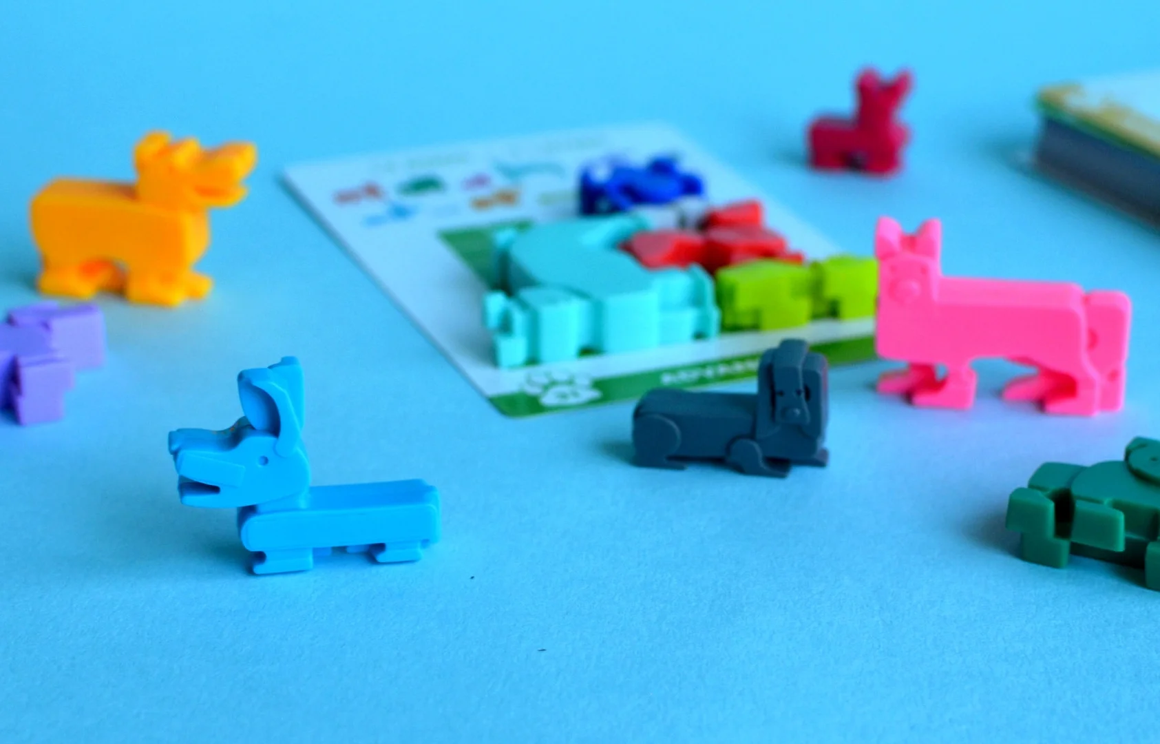 Dog Pile – the pup packing puzzle. Learn More