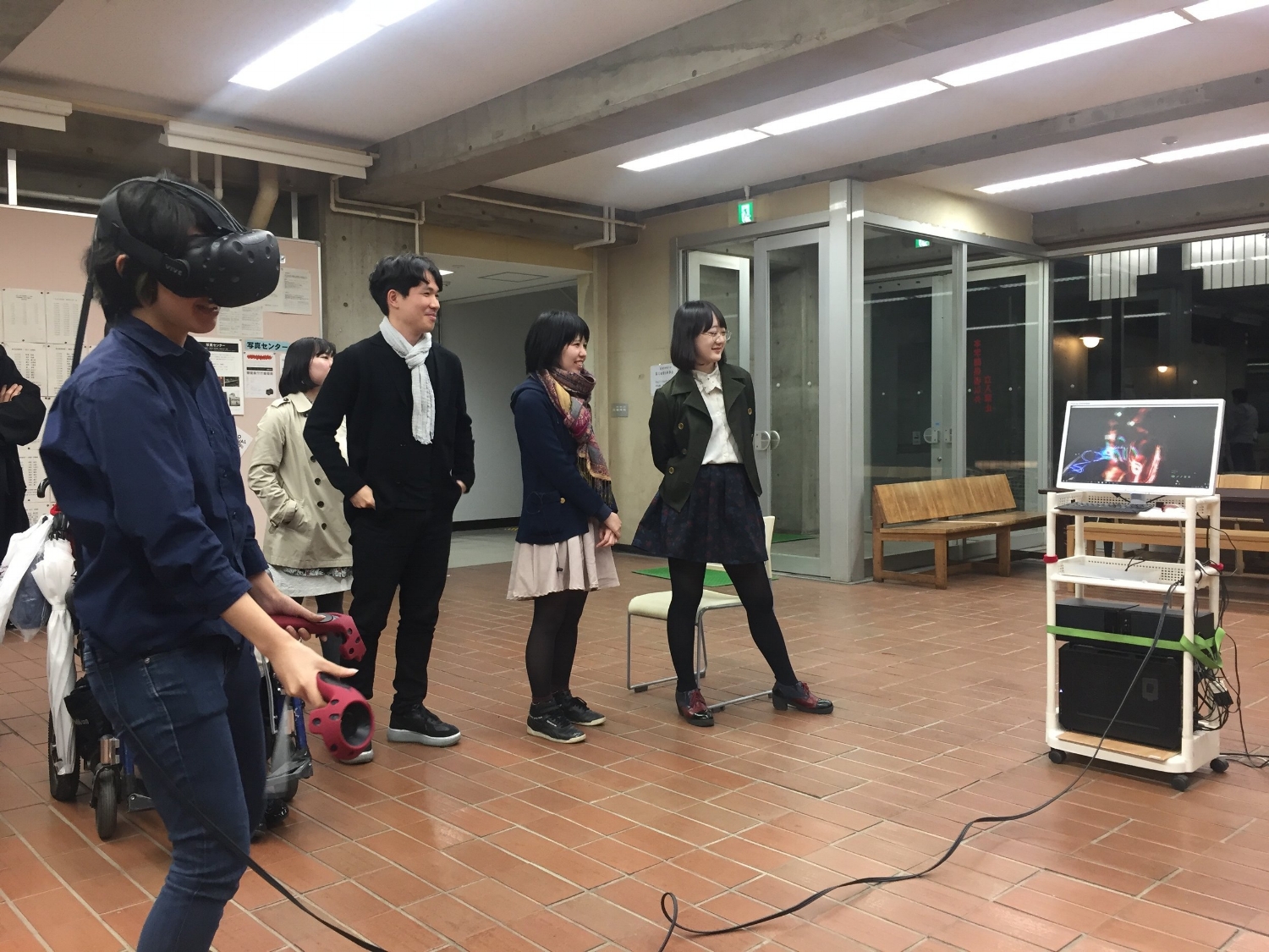 TUA students trying on Virtual Reality project by lecturer Hachiya Kazuhiko