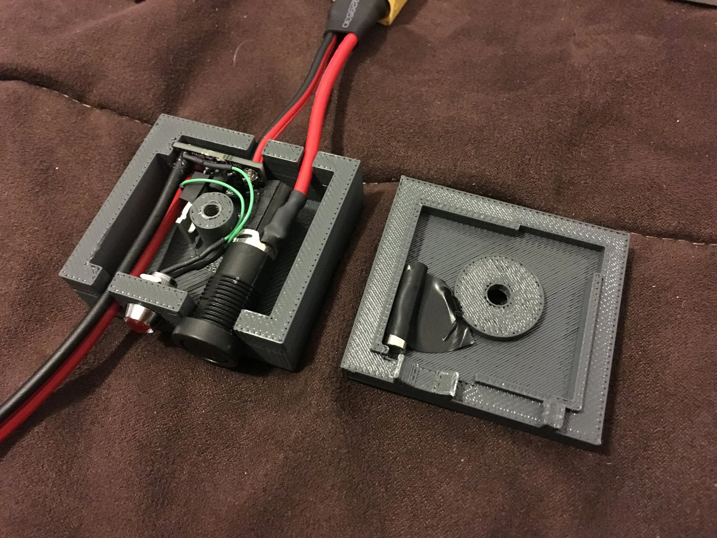 I 3D printed an enclosure to hold the low voltage cutoff board and added a power status LED. I can also hold one additional fuse.