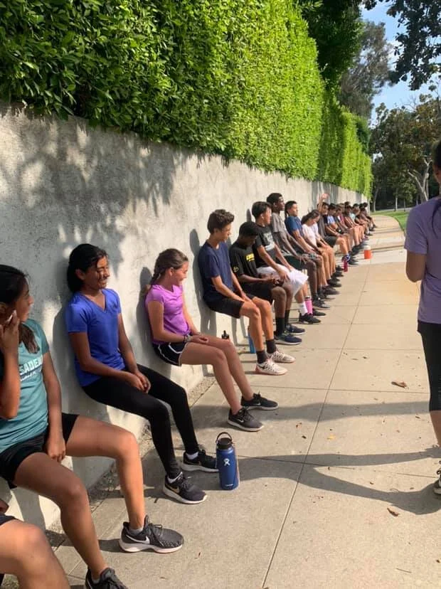 “Blair SRLA did hills and finished with some strength training today...they love wall sits 😆” - Veronica