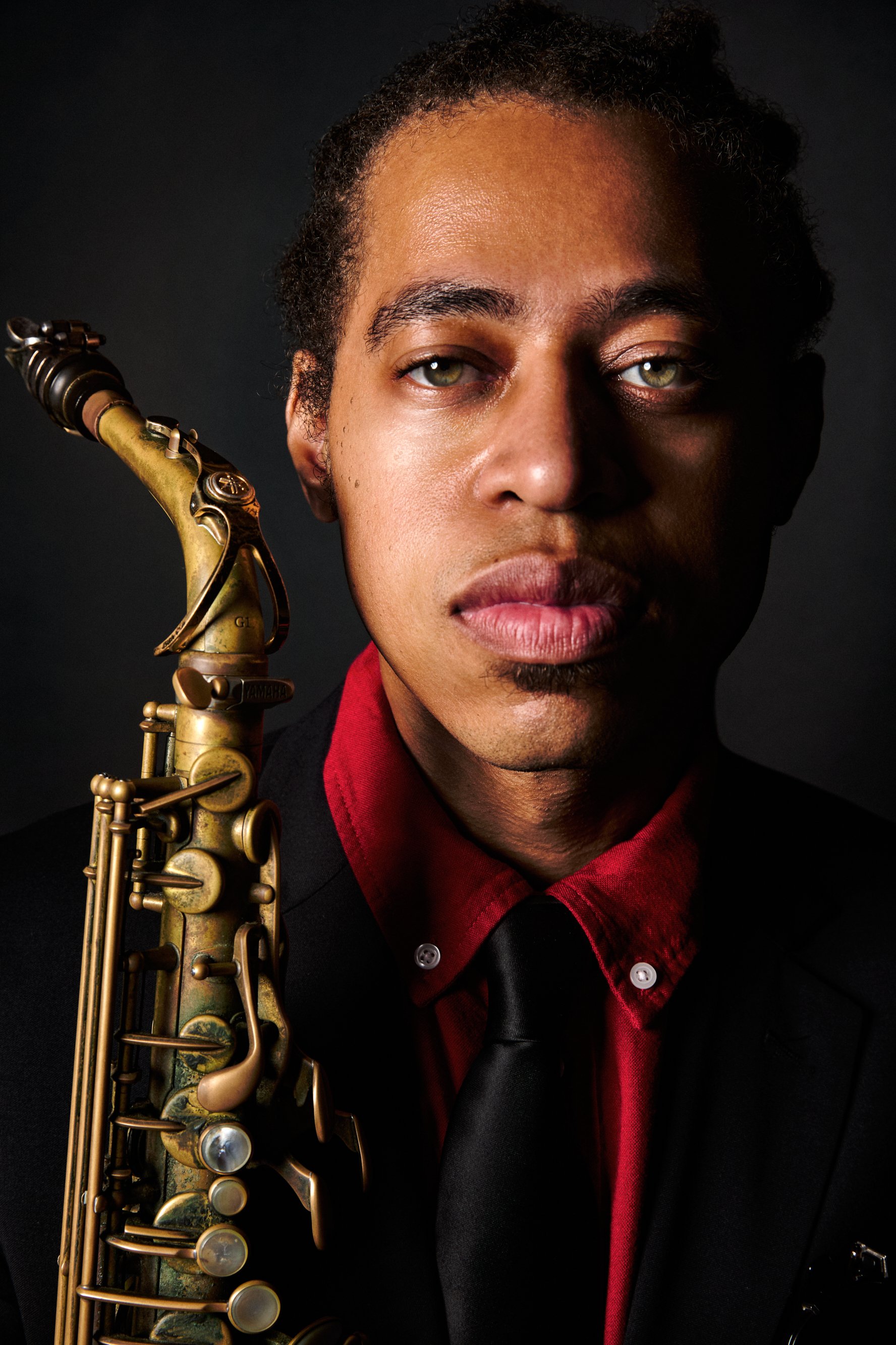Irwin Hall portrait with saxophone
