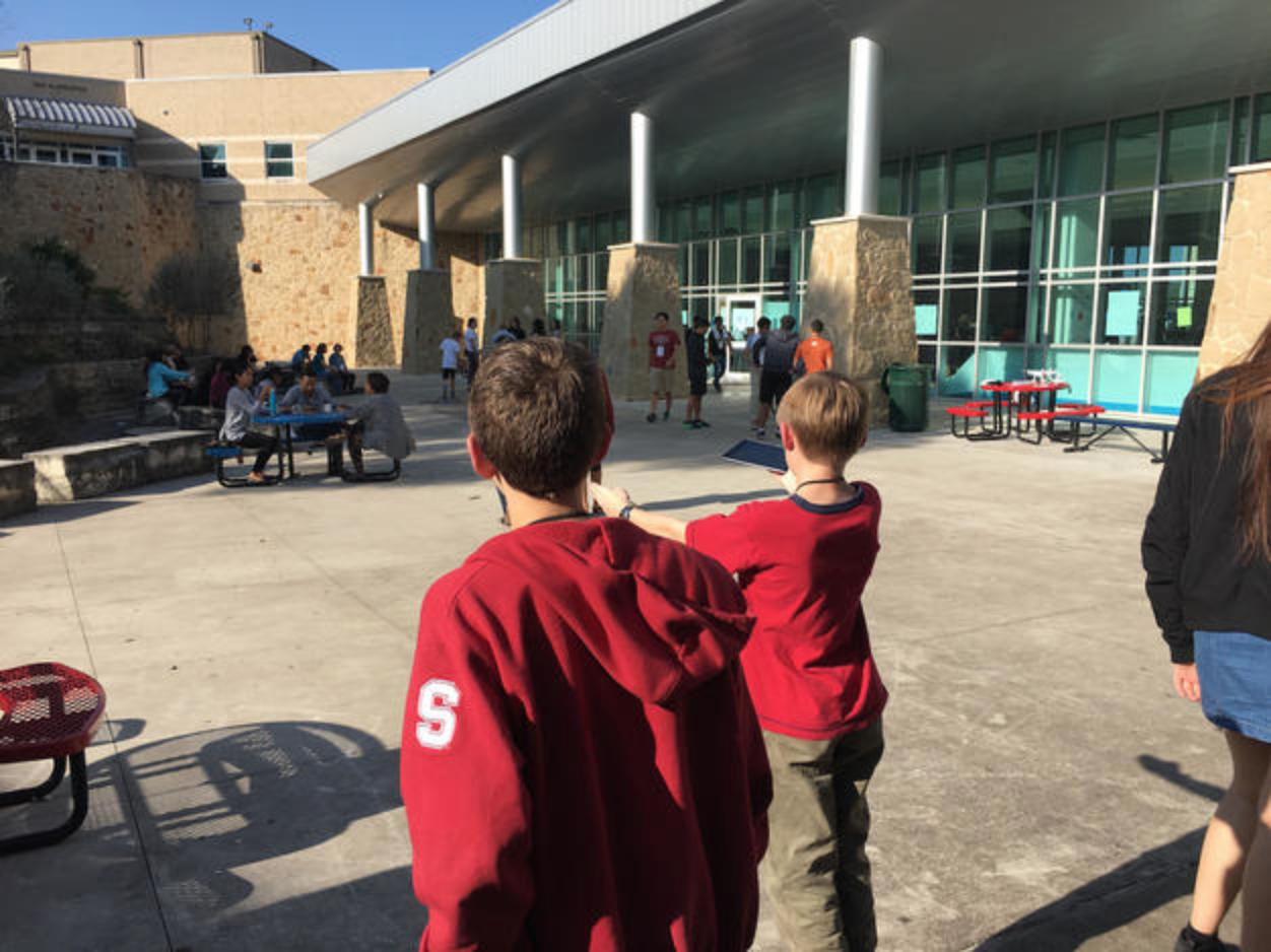 Students estimate distance between takeoff and landing pads