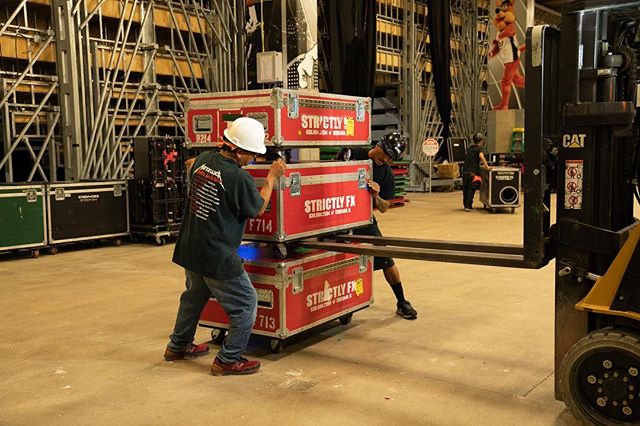 San Antonio crew, unstacking road cases.