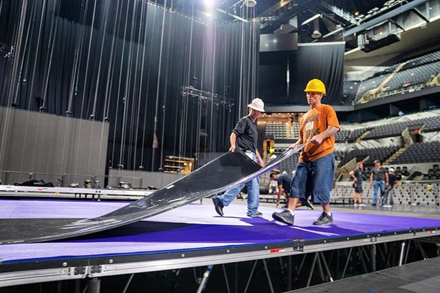 Crew laying down marley flooring