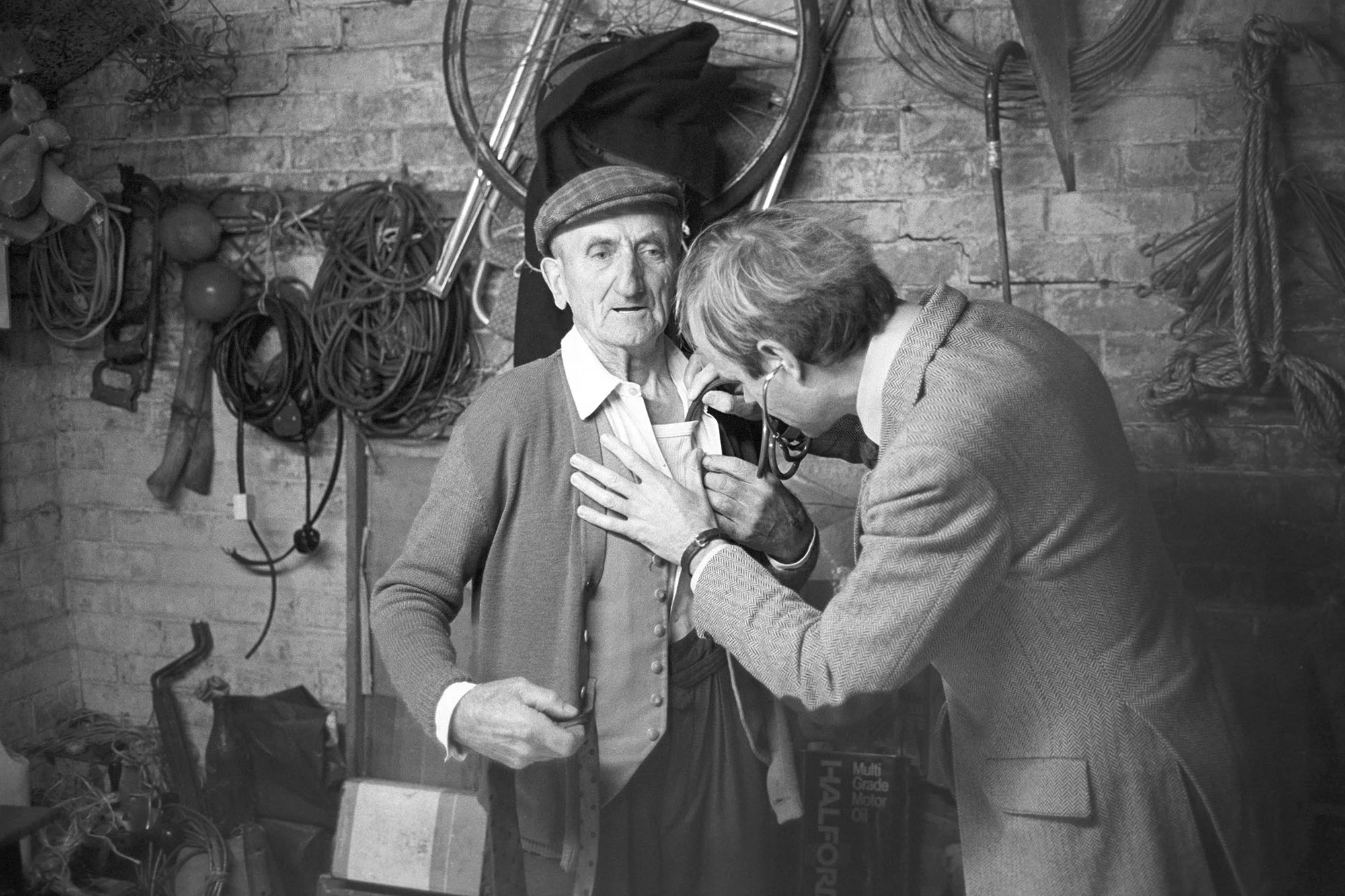 Dr Richard Westcott listening to Bill Brown’s chest, South Molton, 1984
