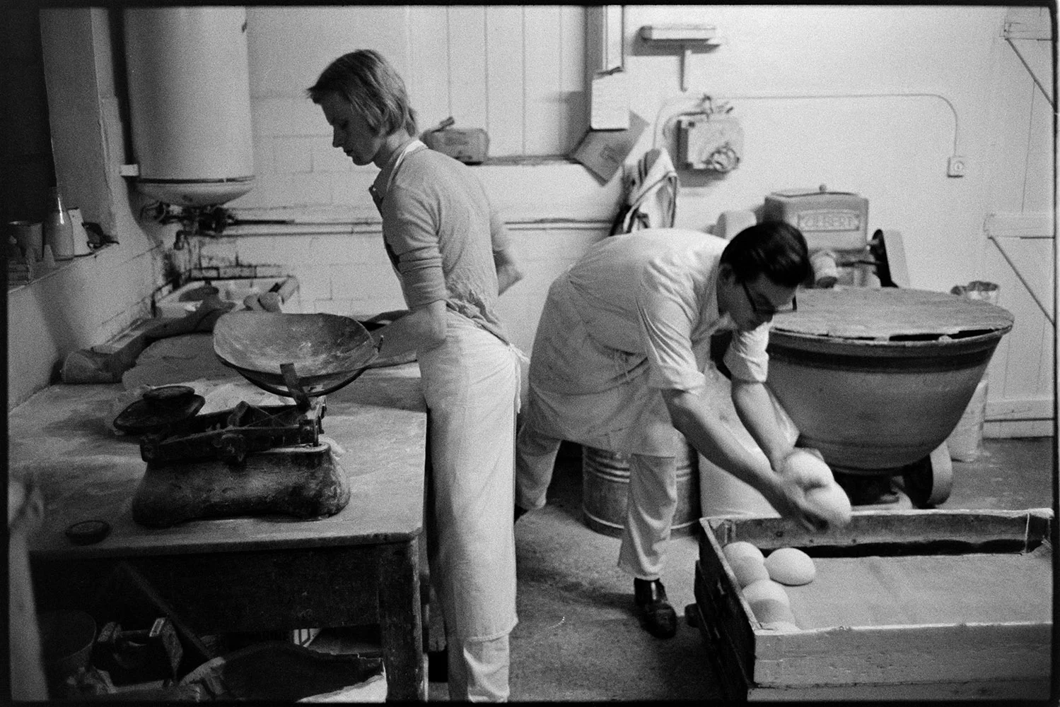 Baker with fresh loaves, very early in the morning, Winkleigh, 15 November 1974