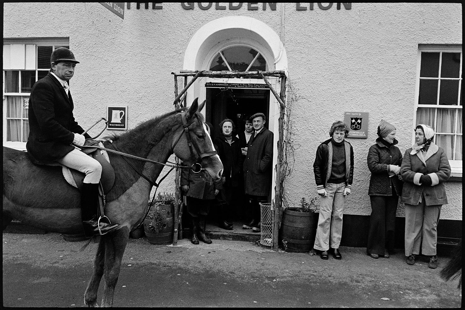 Hunt meet with spectators outside Golden Lion pub, High Bickington, Dec 1977