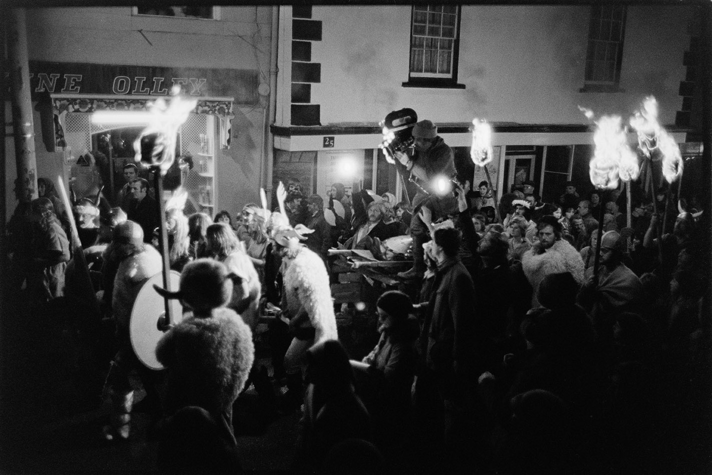 Cameraman held aloft - filming events, Torrington Fair, 2 November 1974