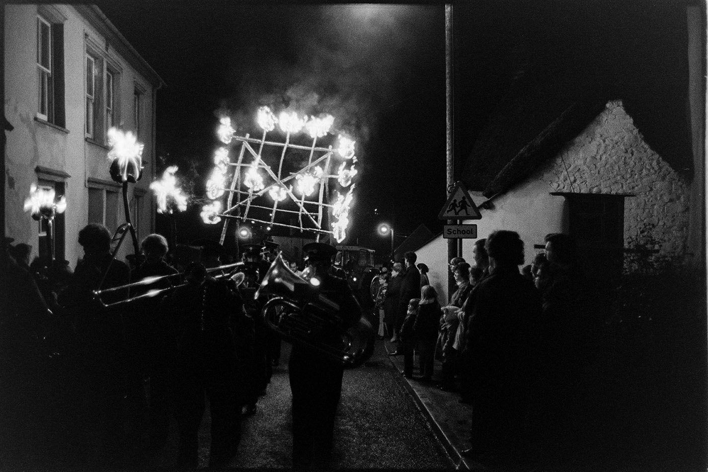 Carnival procession at night with burning torches, Hatherleigh, 6 November 1974