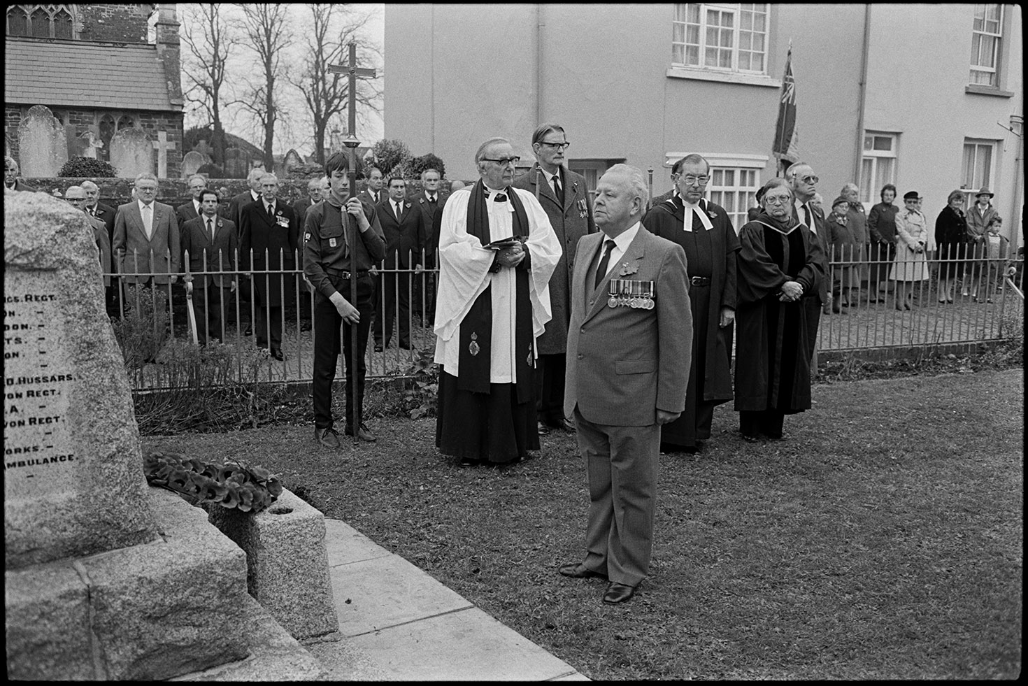 Parade at Memorial, laying wreath by man.  Chulmleigh, November 1987
