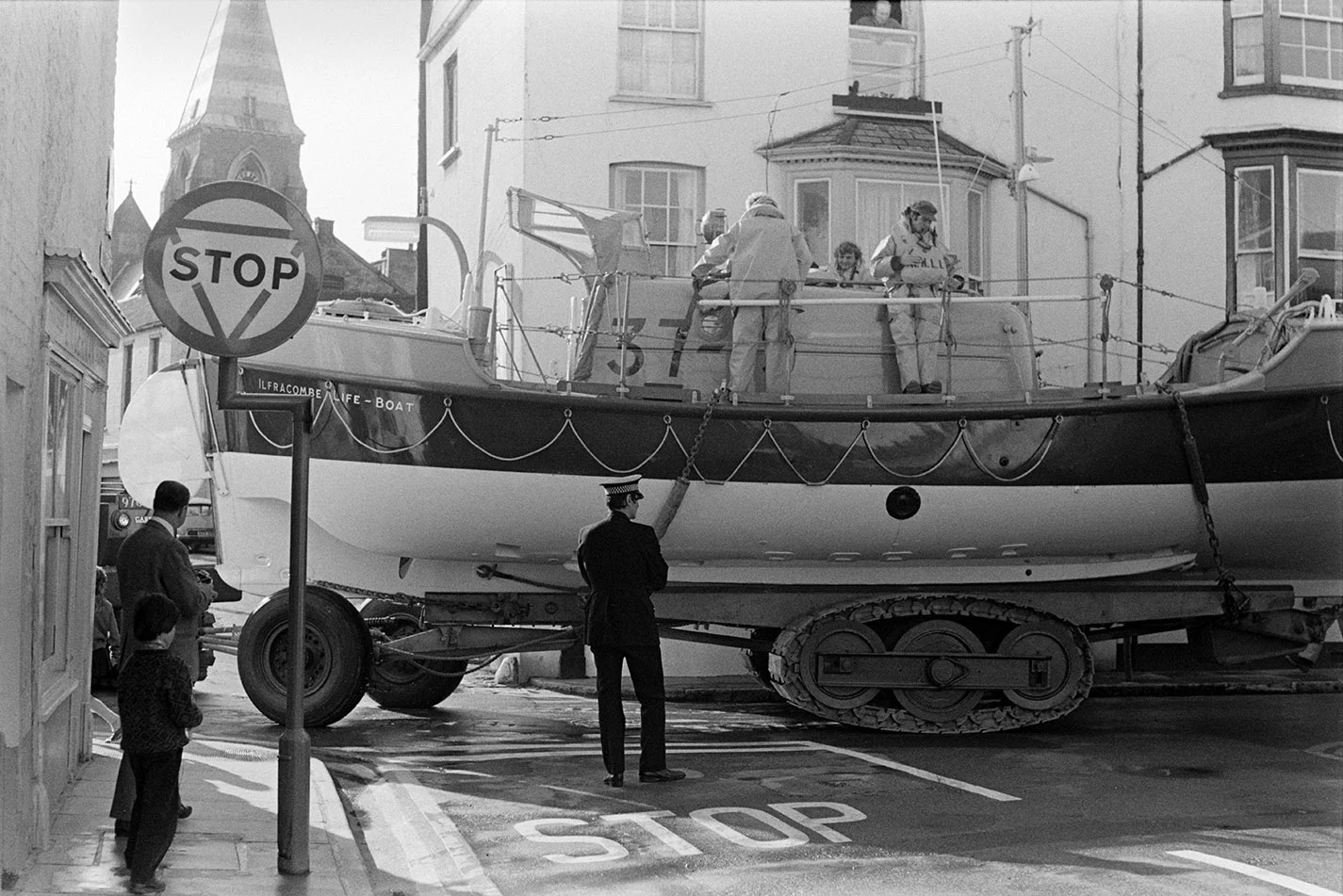Lifeboat through town. Documentary photograph by Roger Deakins for the Beaford Archive © Beaford Arts