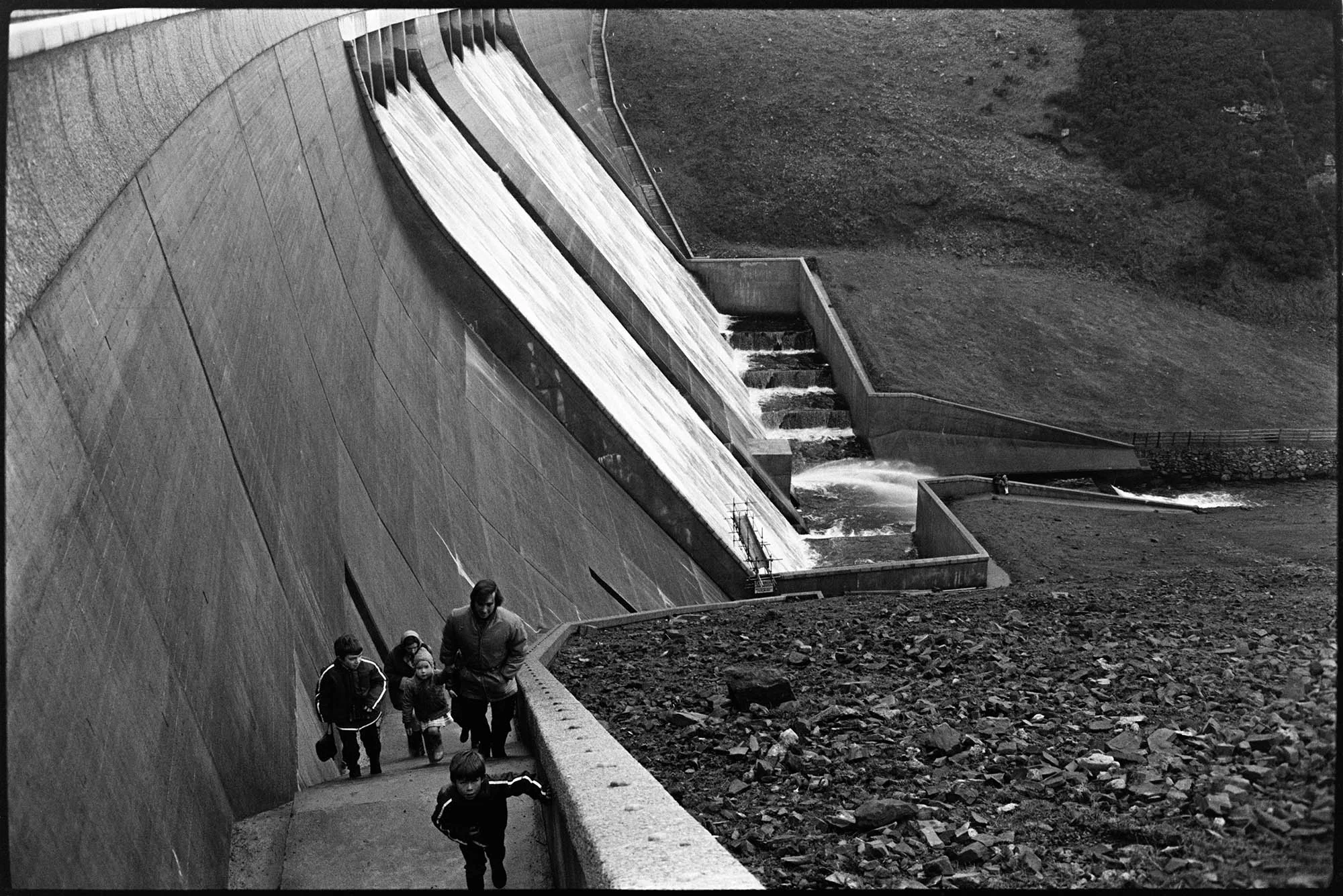 Water cascading over reservoir wall, Meldon. Documentary photograph by James Ravilious for the Beaford Archive © Beaford Arts