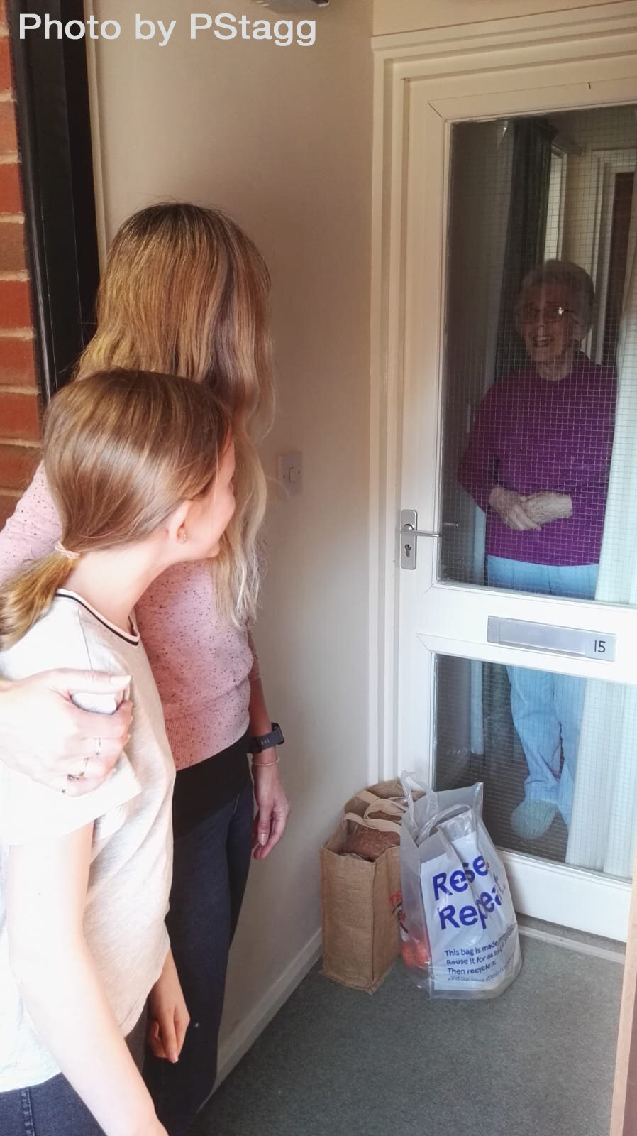 Daughter and Granddaughter delivering food supplies to grandmother during isolation, Barnstaple 210420 PStagg.jpg