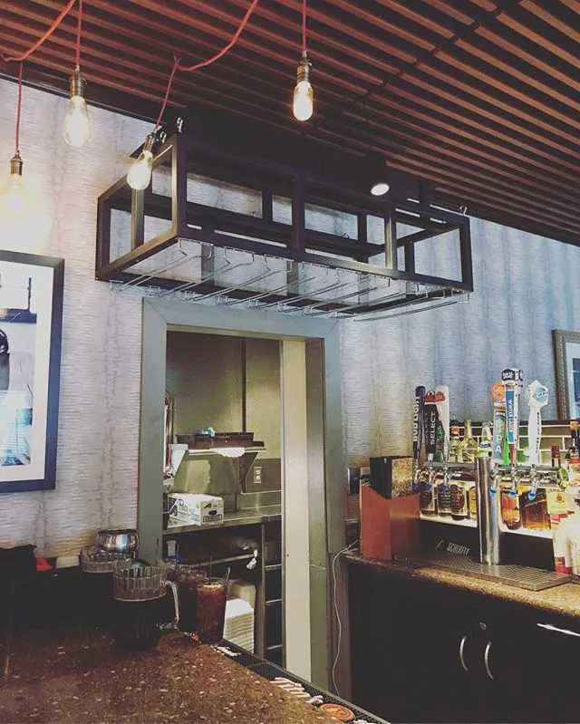 Just finished up a custom glass rack for the amazing Gianinos Family!  We worked with @hospitalityinprogress to get this concept from a vision to hanging from the ceiling. #henleyforge #customfabrication #metal #rack