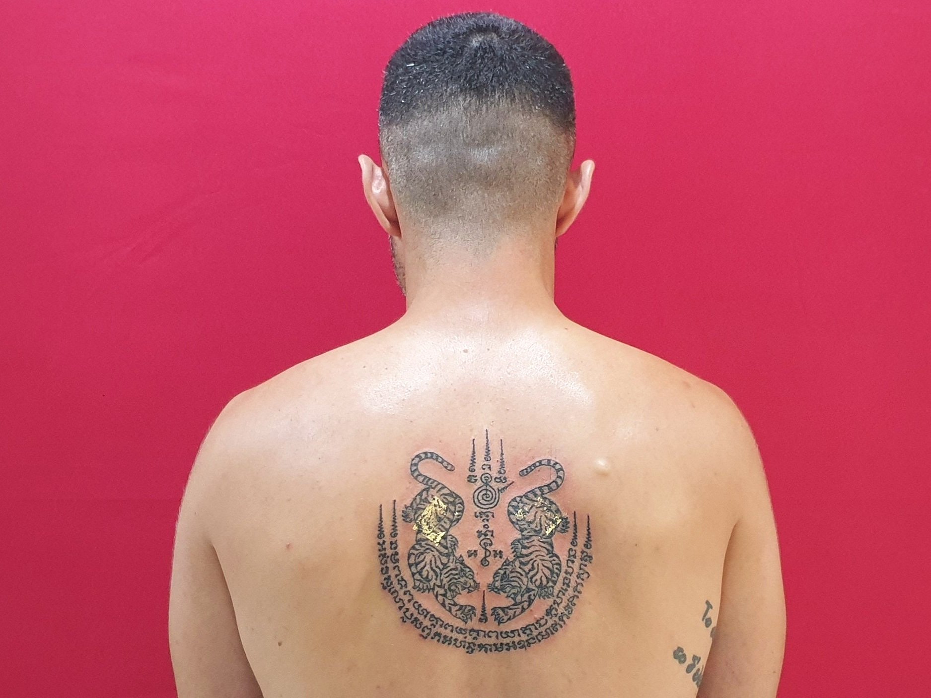 Sak Yant tattoo by Grandmaster Ajarn Pum — Thai Tattoo Café
