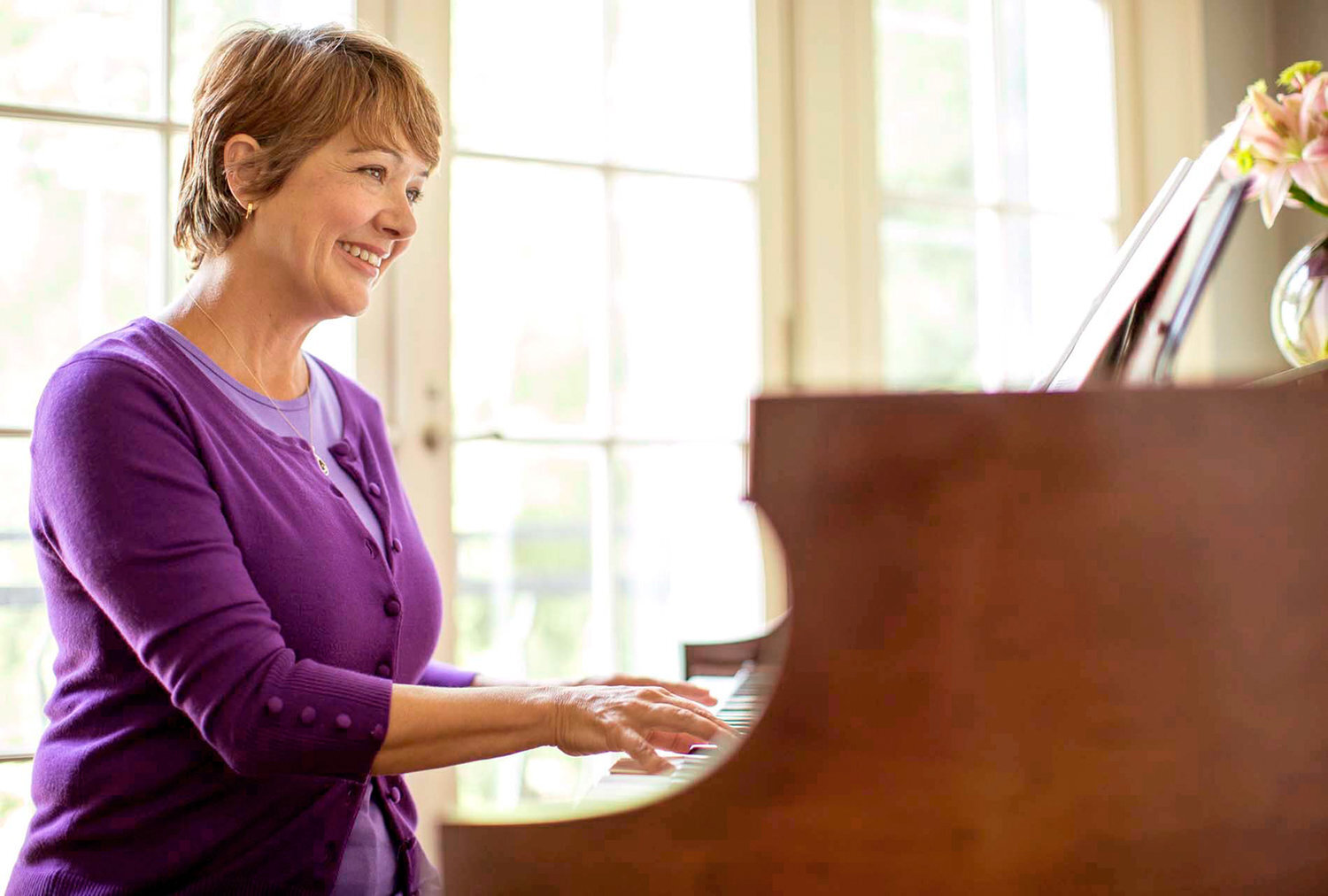 Healthcare lifestyle image of mature woman in home environment, photographed for pharmaceutical advertising campaign in Miami.
