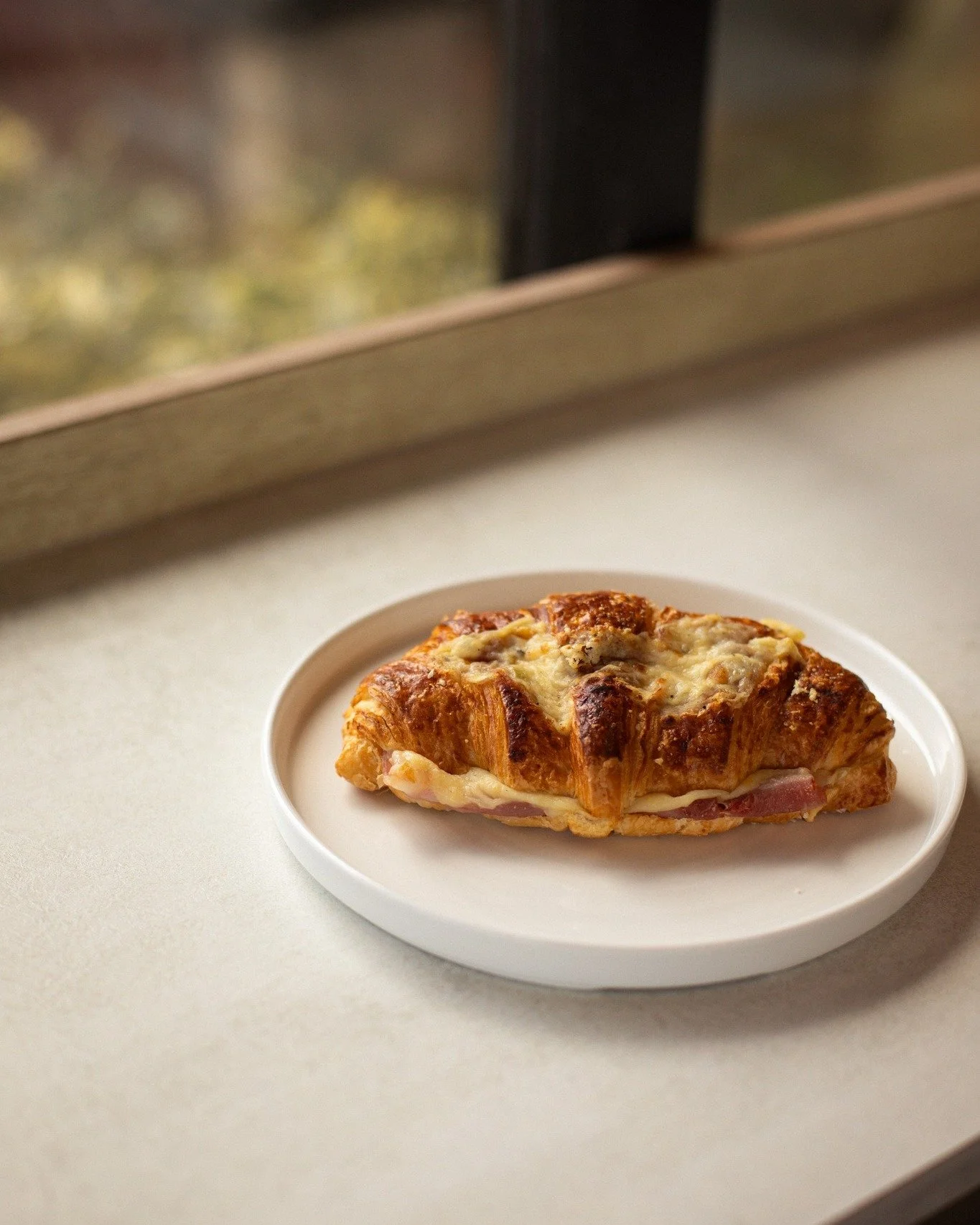 Our classic croissant, upgraded 🥐✨

Baked croissants are a great choice, whatever time of the day!

On the counter, while stocks last. 

#BakedCroissants #SavouryLove #FreshlyBaked