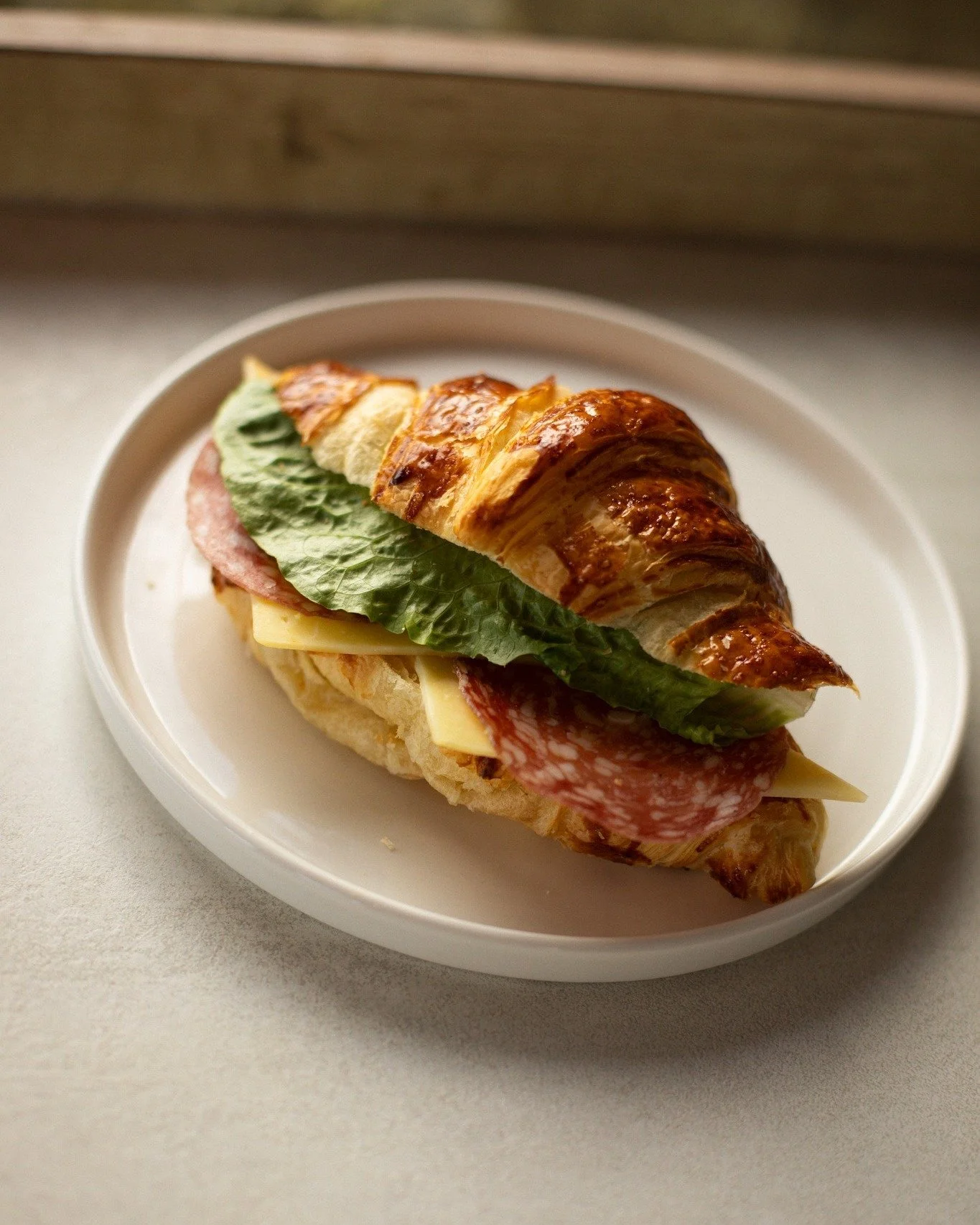 Somewhere between a pastry and a sandwich 🙌

Meet your new go-to: a perfectly flaky croissant filled with salami, cheddar cheese, and crisp lettuce. Freshly prepared to enjoy with us or on the go! 

#ForTheLoveOfSavoury #TheWorkhouse #FreshlyPrepare